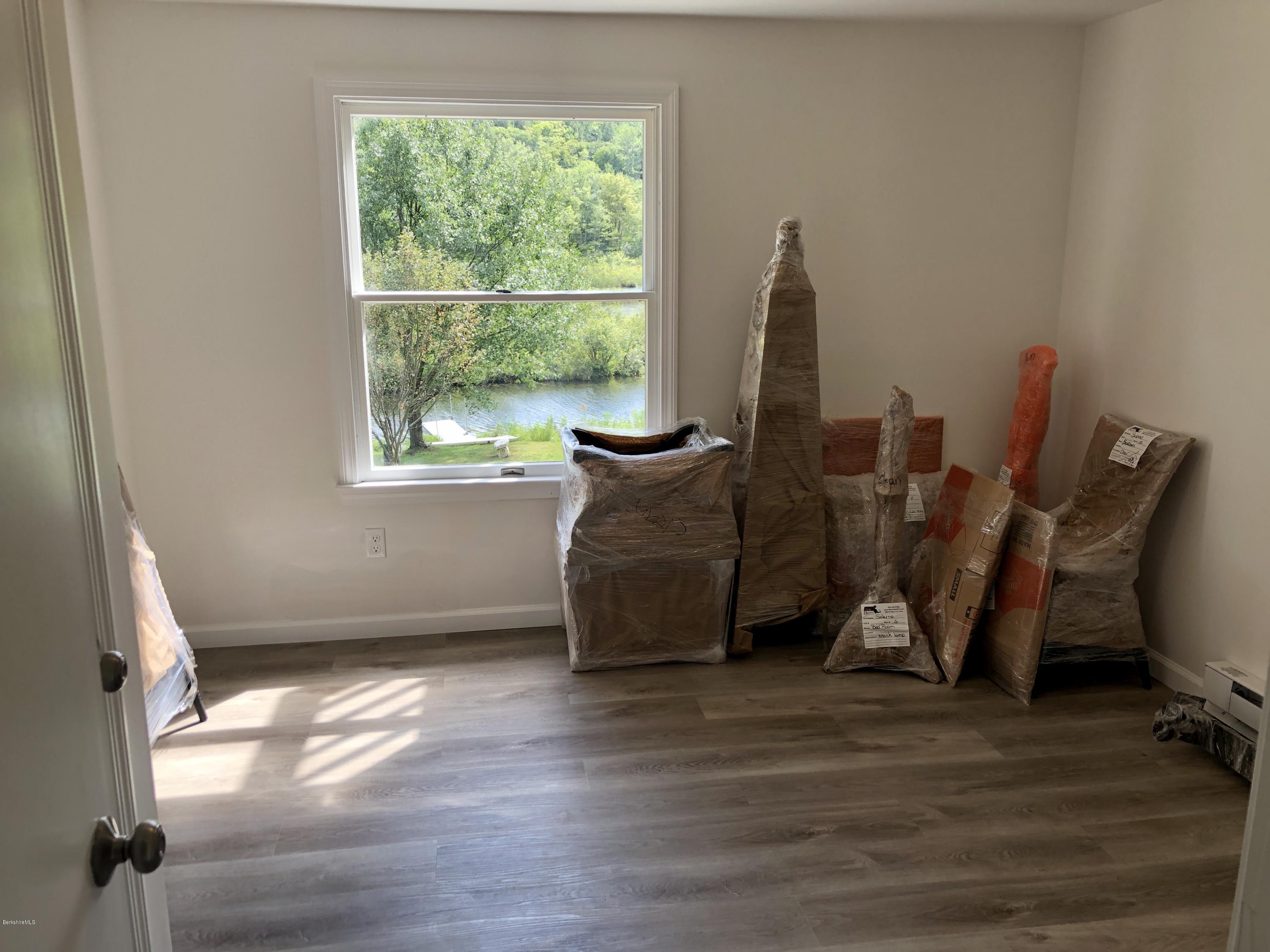 8 Dowd Road Monterey, MA 01245 - Photo 17 of 25 a view of a room with furniture and a window