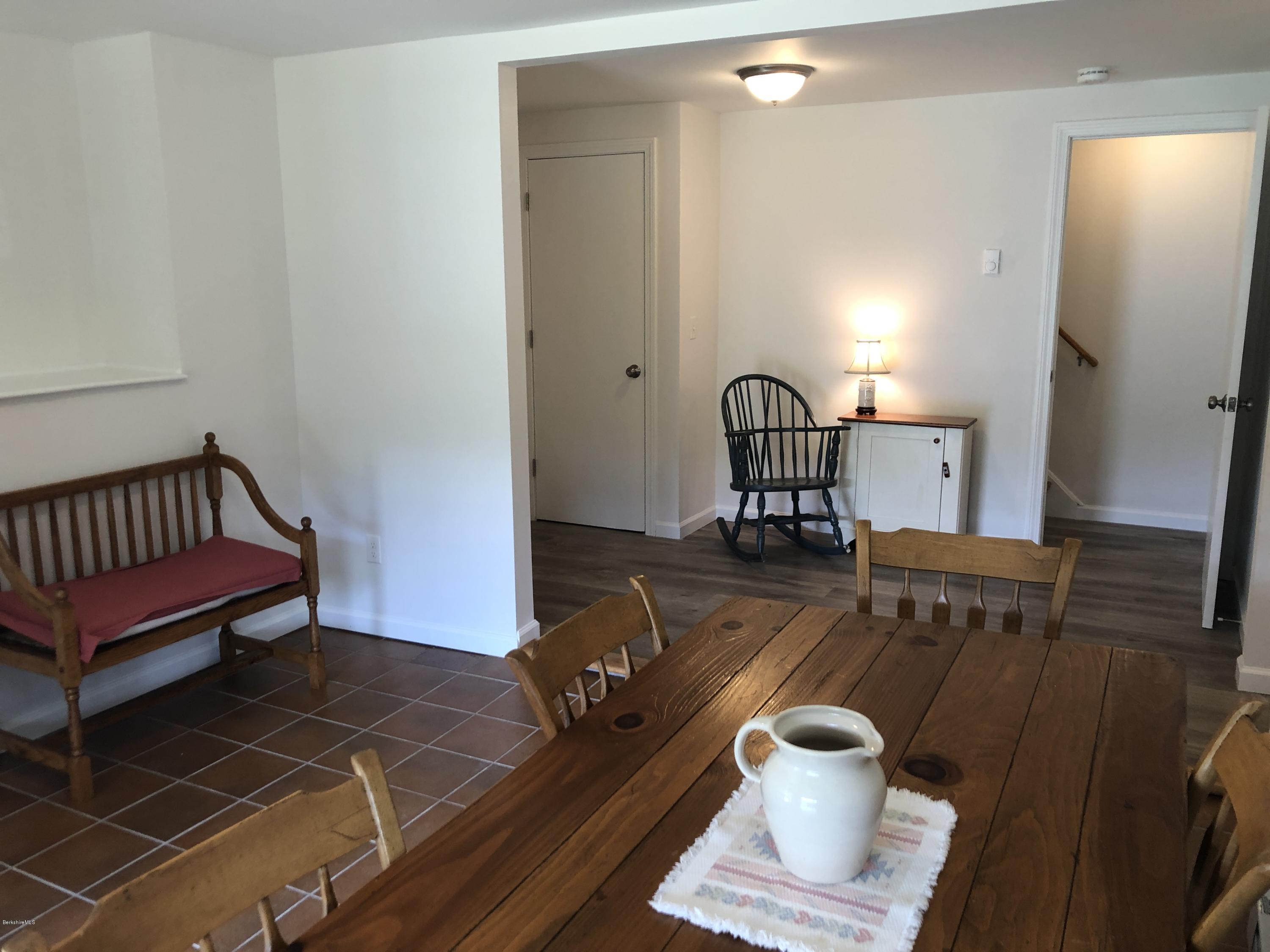 8 Dowd Road Monterey, MA 01245 - Photo 19 of 25 a living room with a couch and a potted plant