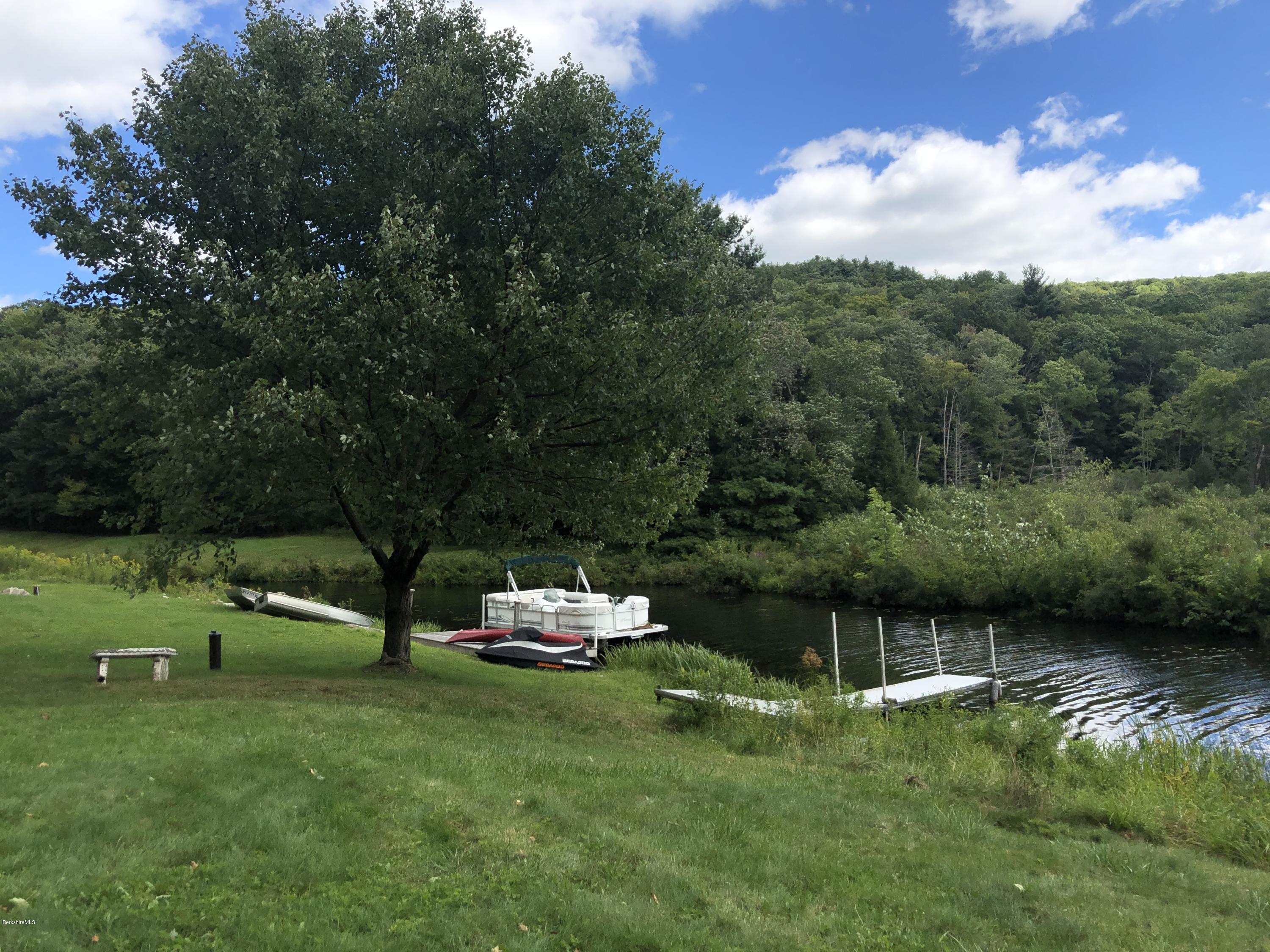 8 Dowd Road Monterey, MA 01245 - Photo 5 of 25 a view of a lake with a yard