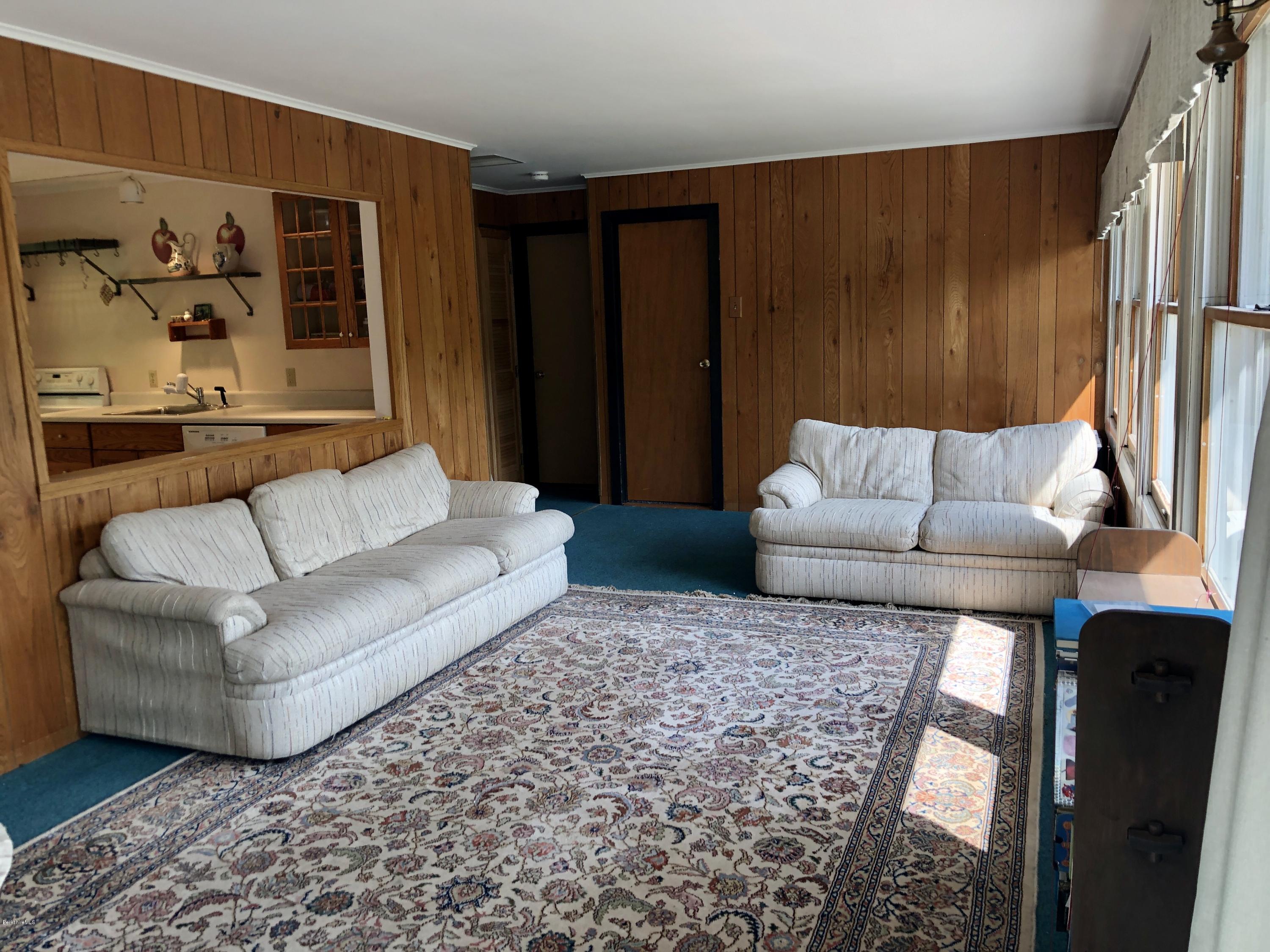 8 Dowd Road Monterey, MA 01245 - Photo 7 of 25 a living room with furniture and a couch