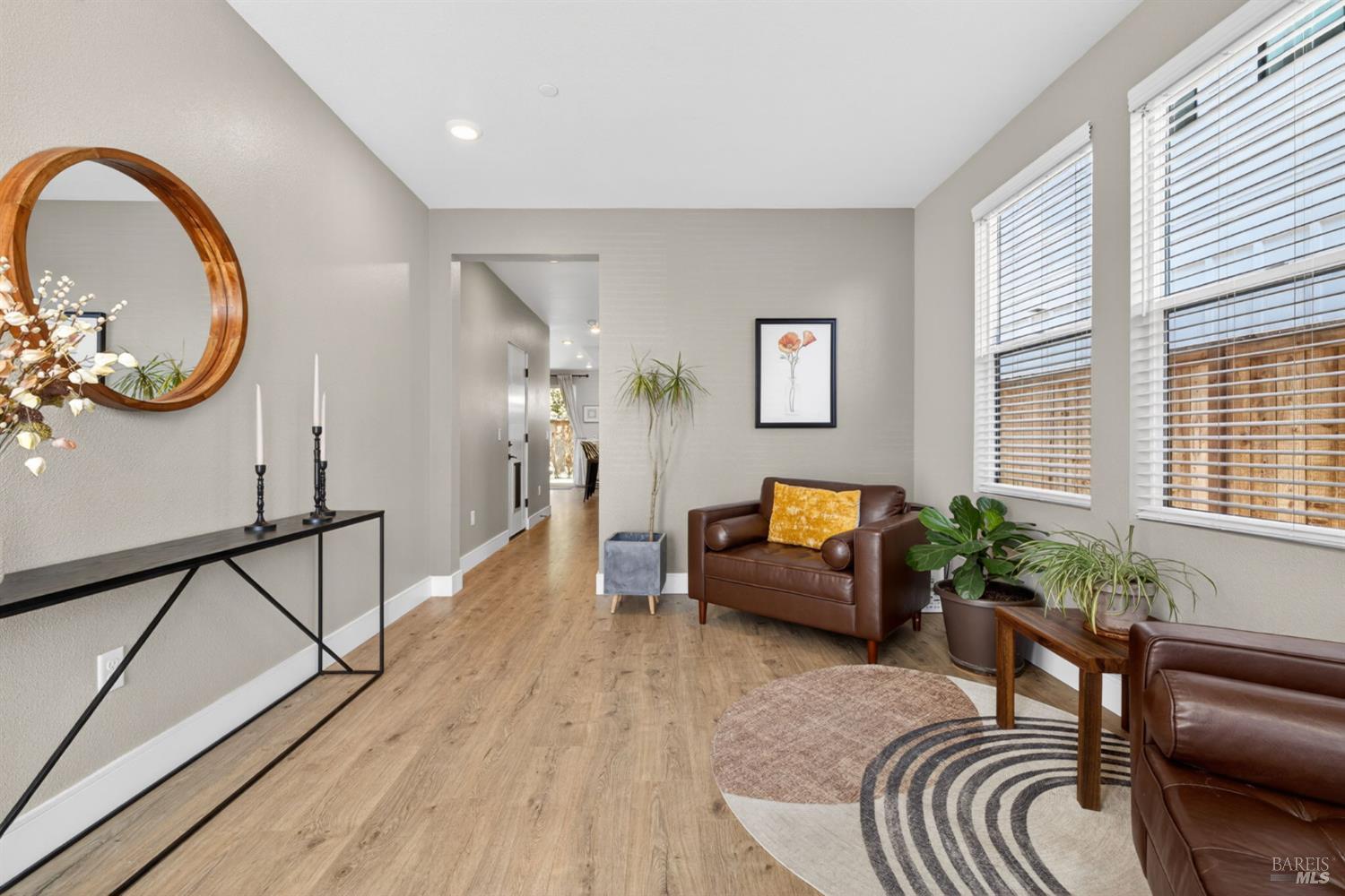 2215-2217 Versaro Drive Santa Rosa, CA 95403 - Photo 6 of 45 a living room with furniture and wooden floor