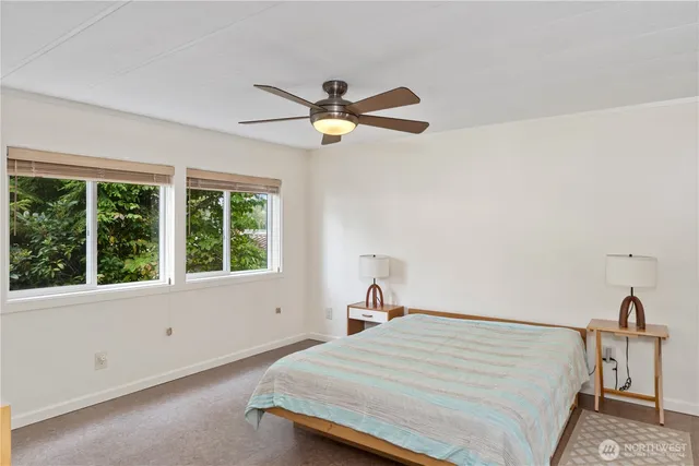 a bathroom with a double vanity sink mirror double and shower