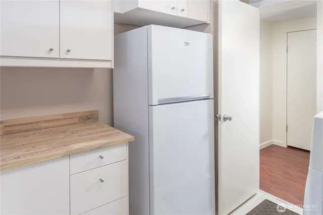 a view of a porch with furniture and a fire pit