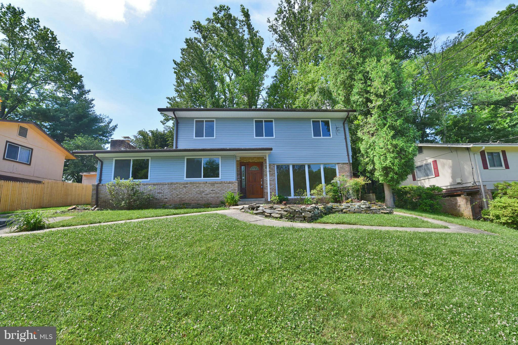 13516 Collingwood Terrace Silver Spring, MD 20904 - Photo 2 of 29 a front view of a house with a yard and porch