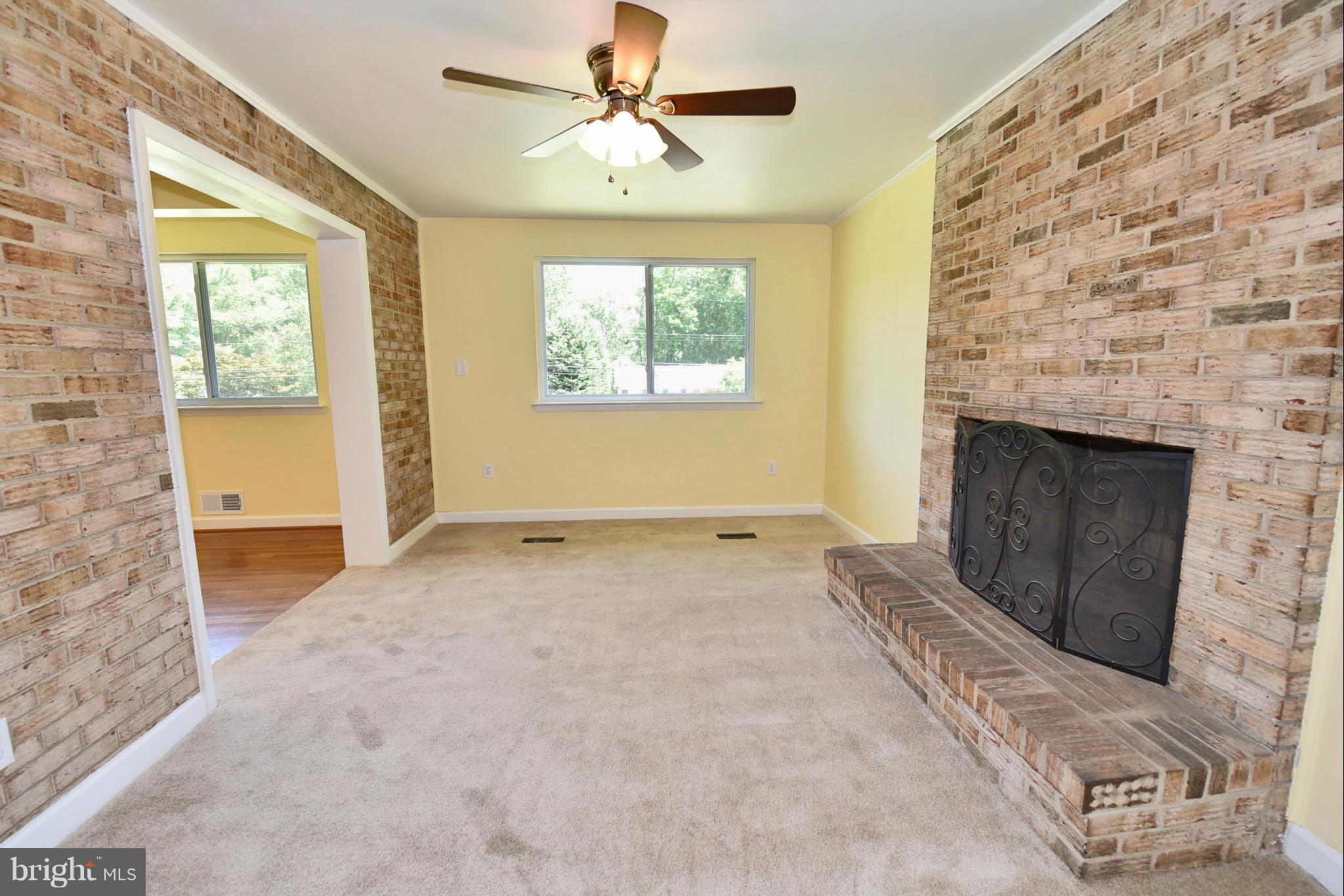 13516 Collingwood Terrace Silver Spring, MD 20904 - Photo 12 of 29 wooden floor in an empty room with a fireplace