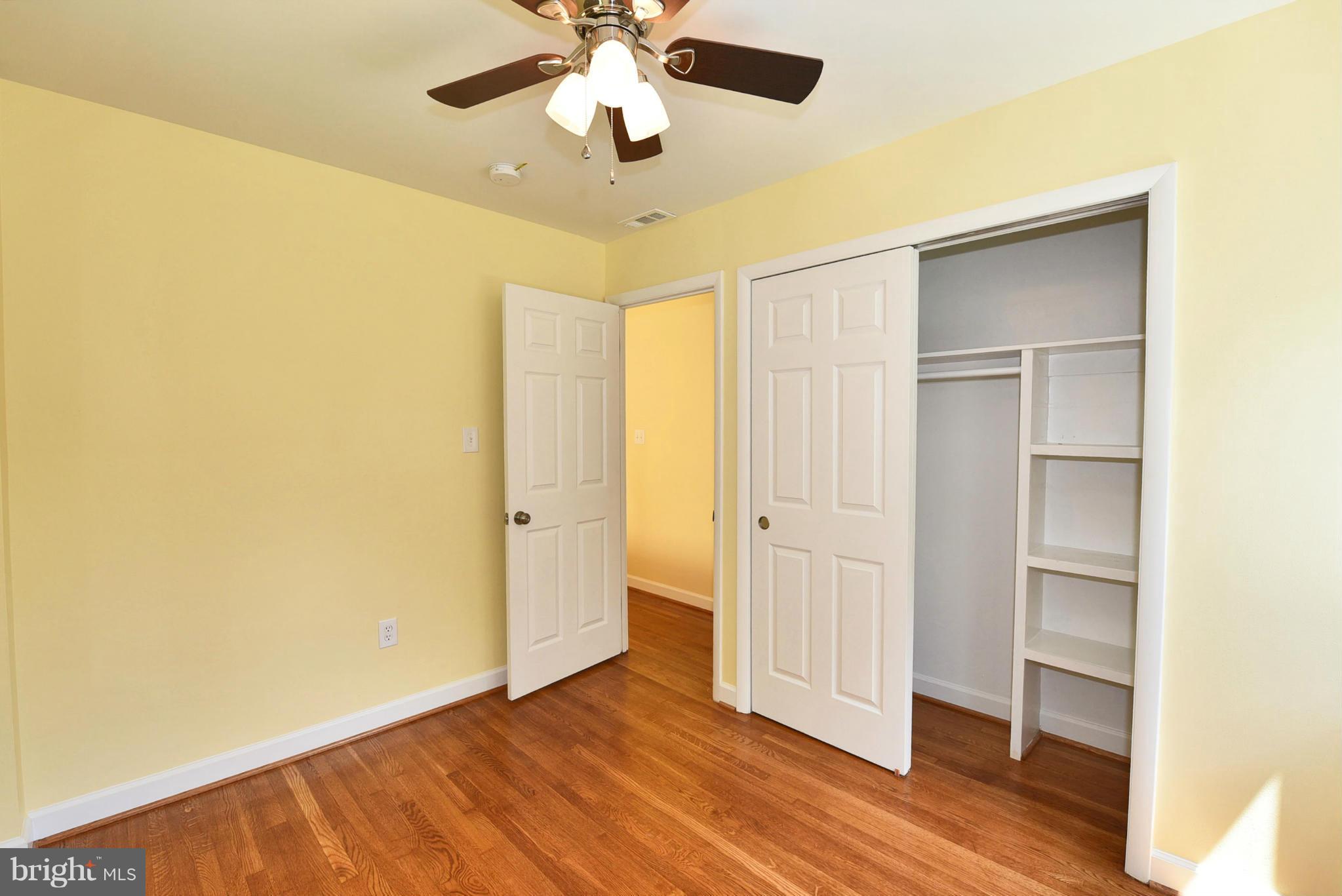 13516 Collingwood Terrace Silver Spring, MD 20904 - Photo 16 of 29 a view of an empty room with wooden floor
