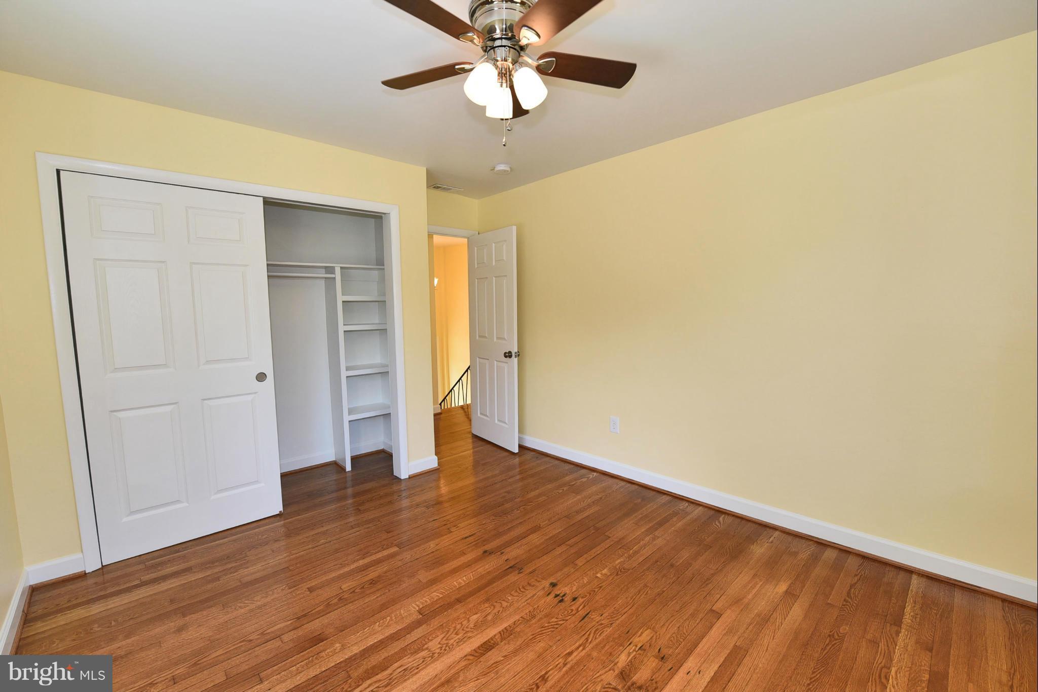 13516 Collingwood Terrace Silver Spring, MD 20904 - Photo 18 of 29 wooden floor in an empty room with a window