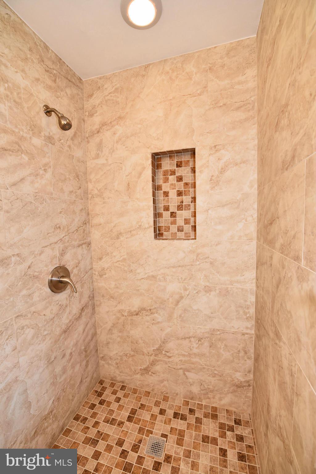 13516 Collingwood Terrace Silver Spring, MD 20904 - Photo 23 of 29 a bathroom with a shower