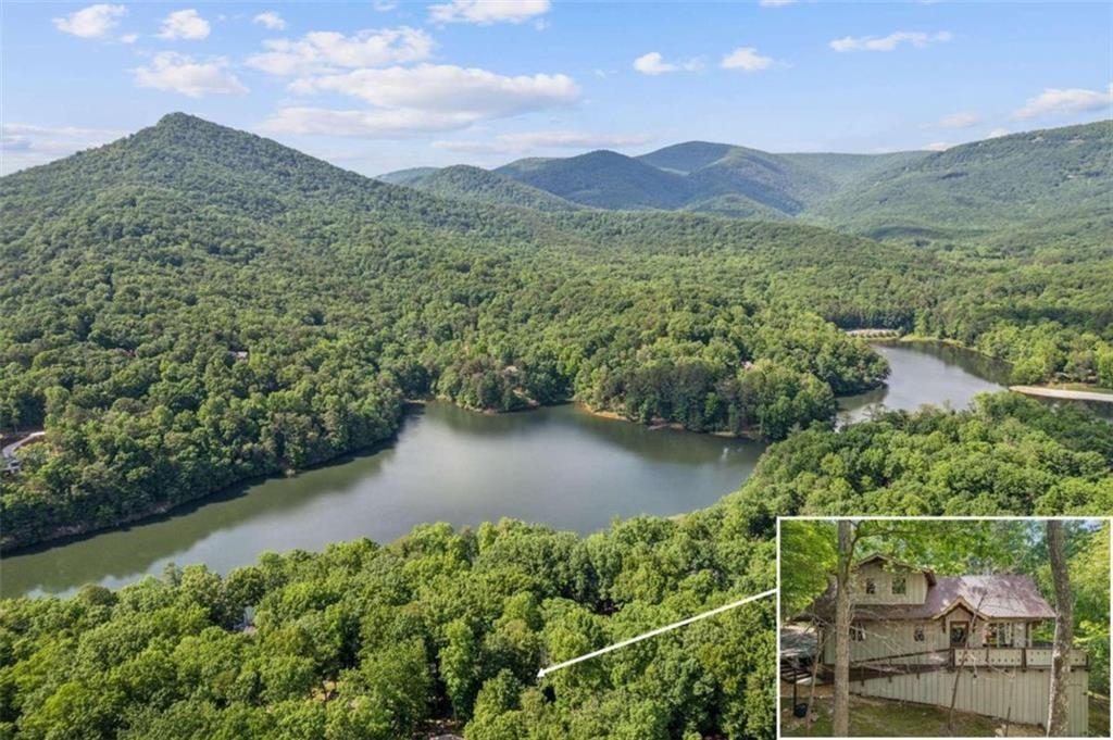 298 Lake View Trace Jasper, GA 30143 - Photo 2 of 33 a view of a lake with a mountain in the background
