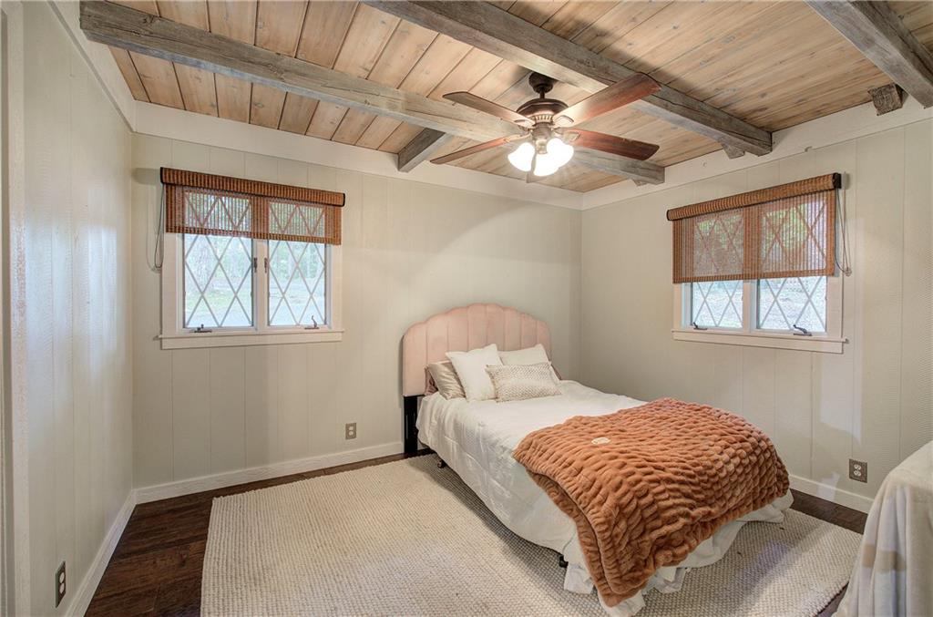 298 Lake View Trace Jasper, GA 30143 - Photo 28 of 33 a bedroom with a large bed and a window