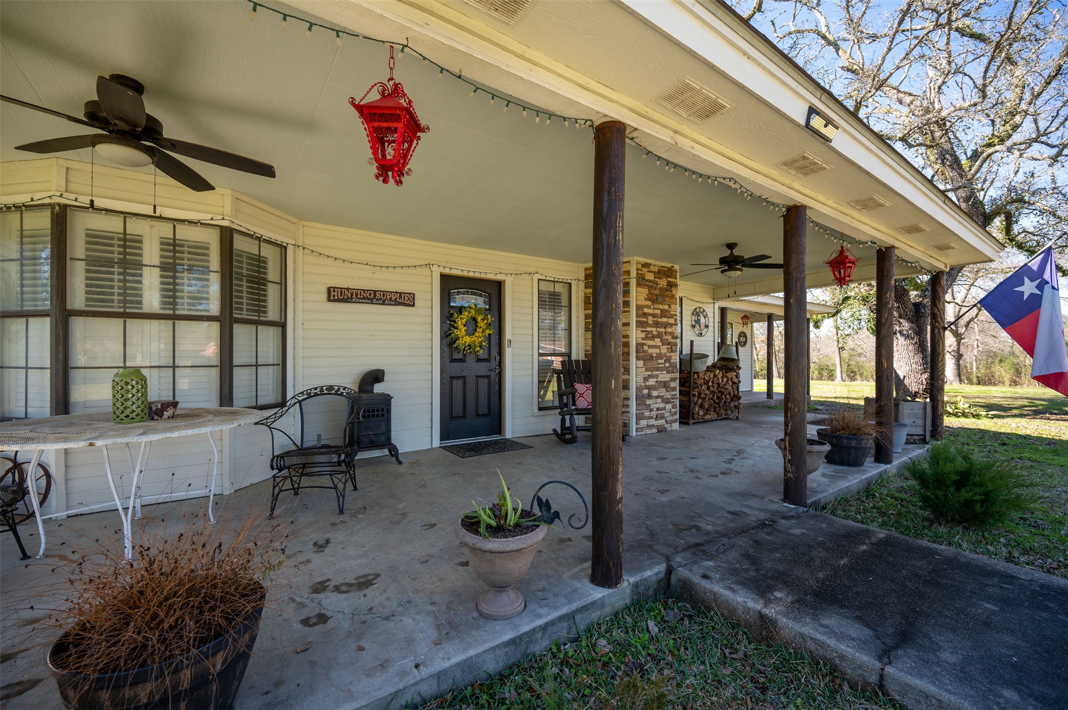 228 Camden Road Chester, TX 75936 - Photo 11 of 50 a view of a porch with dining table and chairs