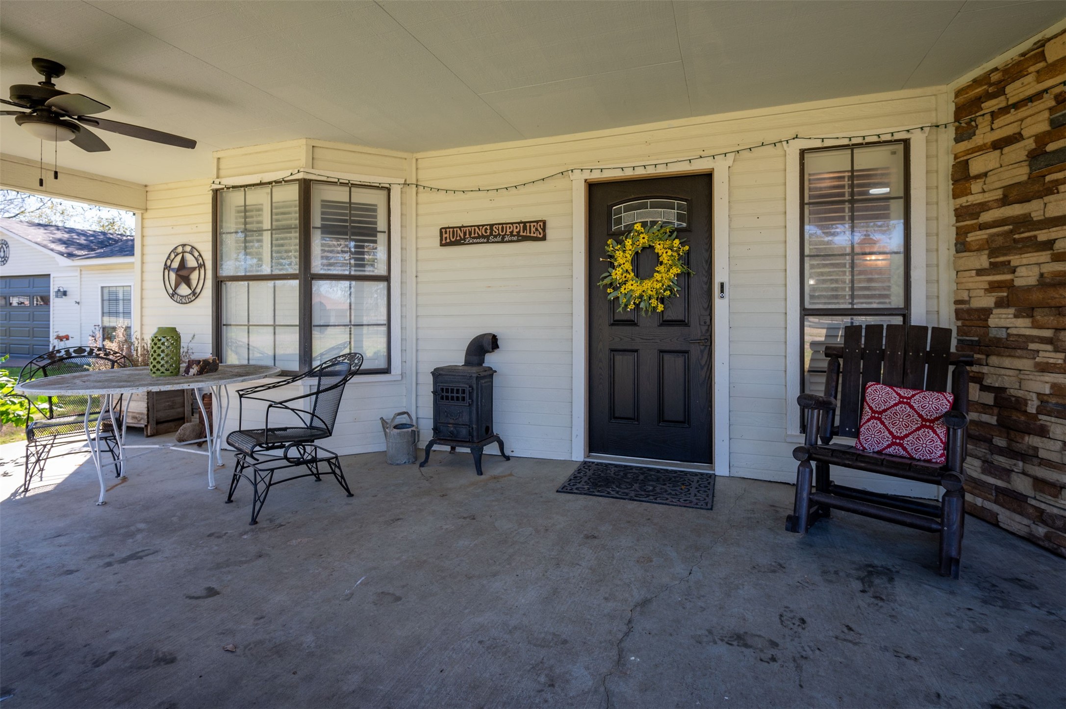 228 Camden Road Chester, TX 75936 - Photo 12 of 50 a living room with furniture a dining table and chairs