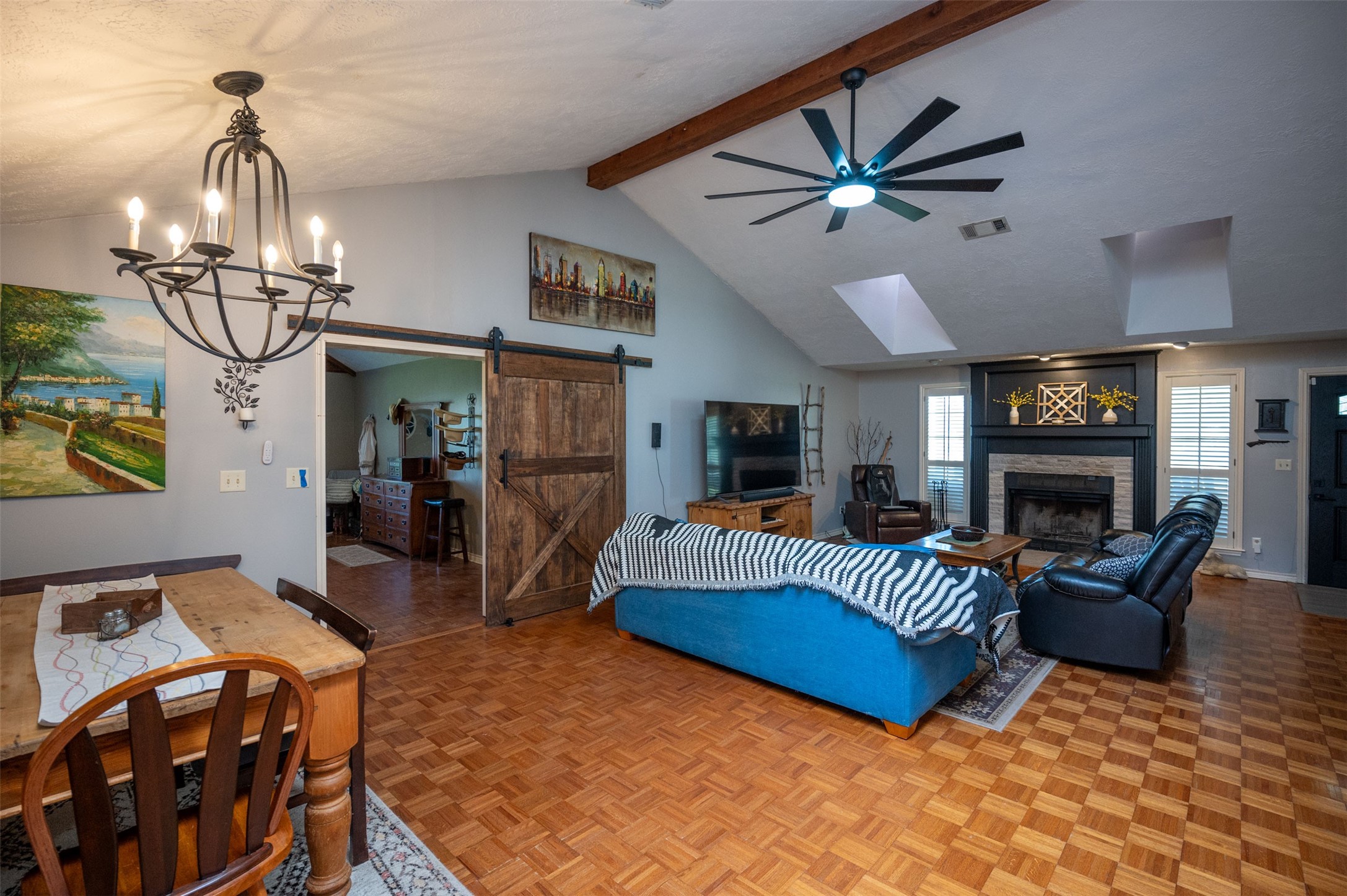 228 Camden Road Chester, TX 75936 - Photo 14 of 50 a living room with furniture a chandelier and a flat screen tv