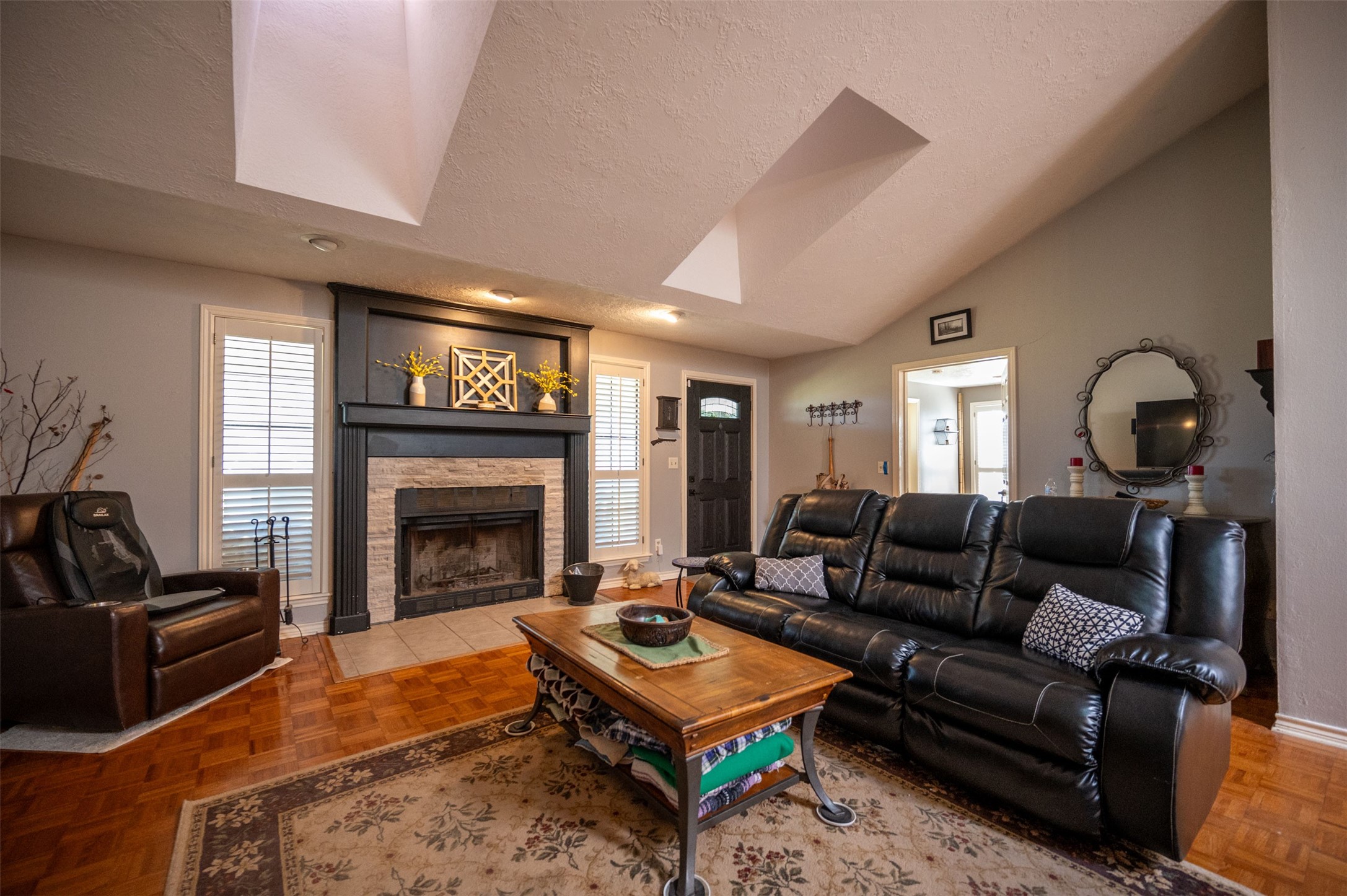 228 Camden Road Chester, TX 75936 - Photo 15 of 50 a living room with furniture and a fireplace