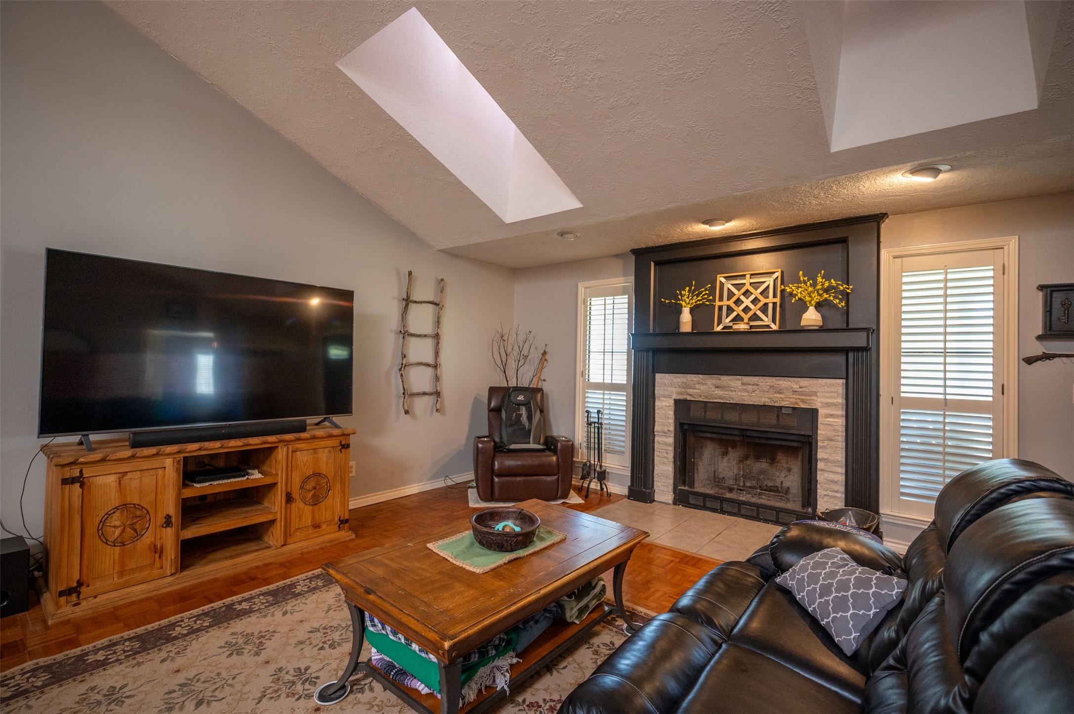 228 Camden Road Chester, TX 75936 - Photo 17 of 50 a living room with furniture and a flat screen tv