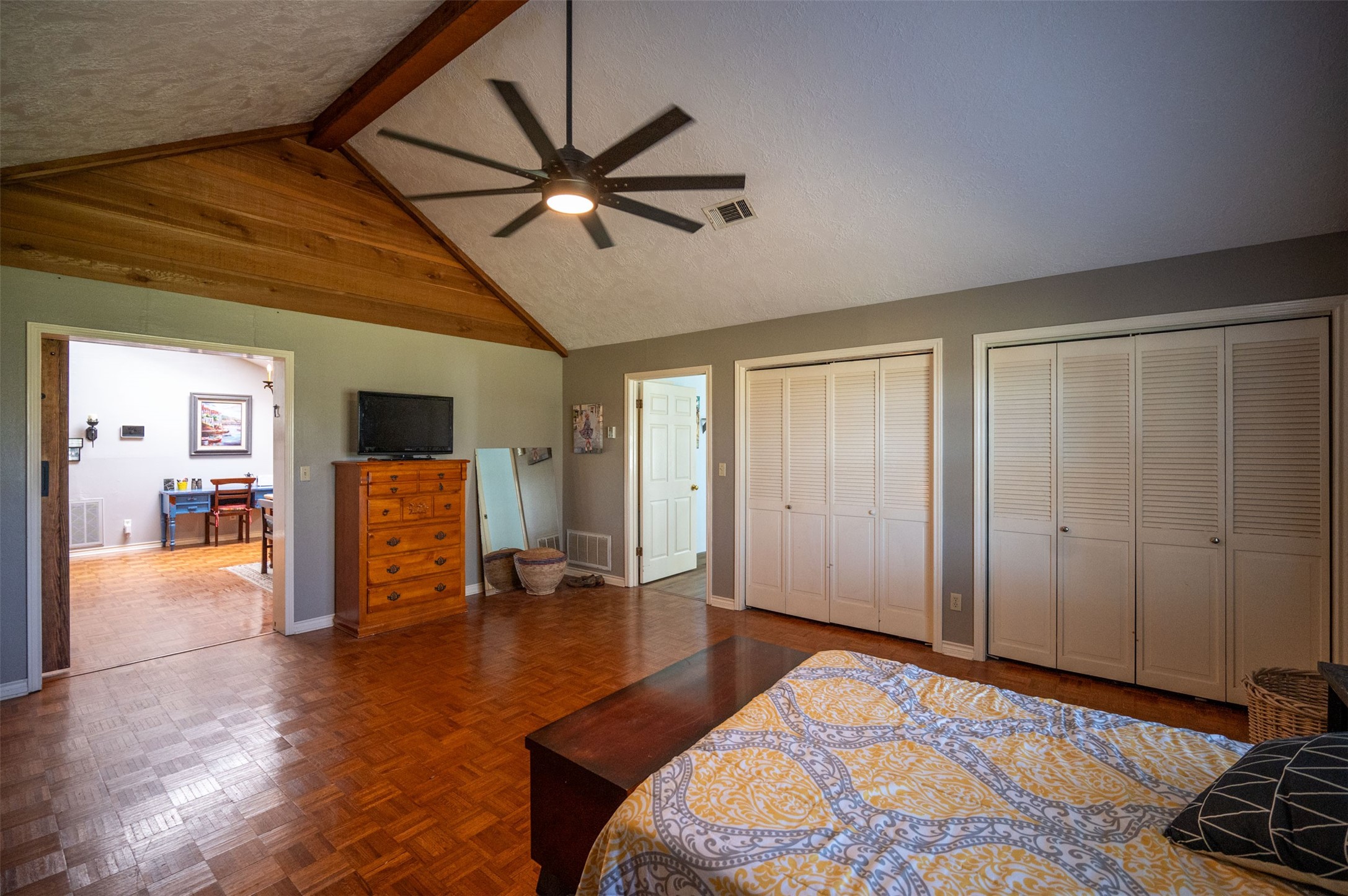 228 Camden Road Chester, TX 75936 - Photo 26 of 50 a bedroom with a bed and a chandelier