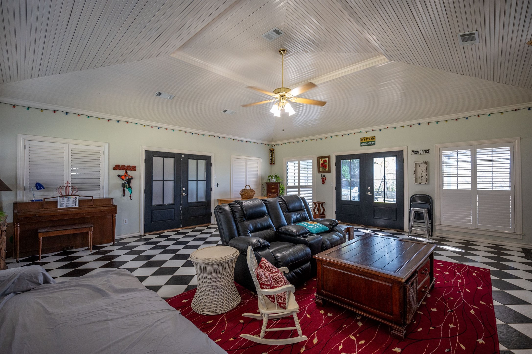 228 Camden Road Chester, TX 75936 - Photo 33 of 50 a living room with furniture ceiling fan and a rug