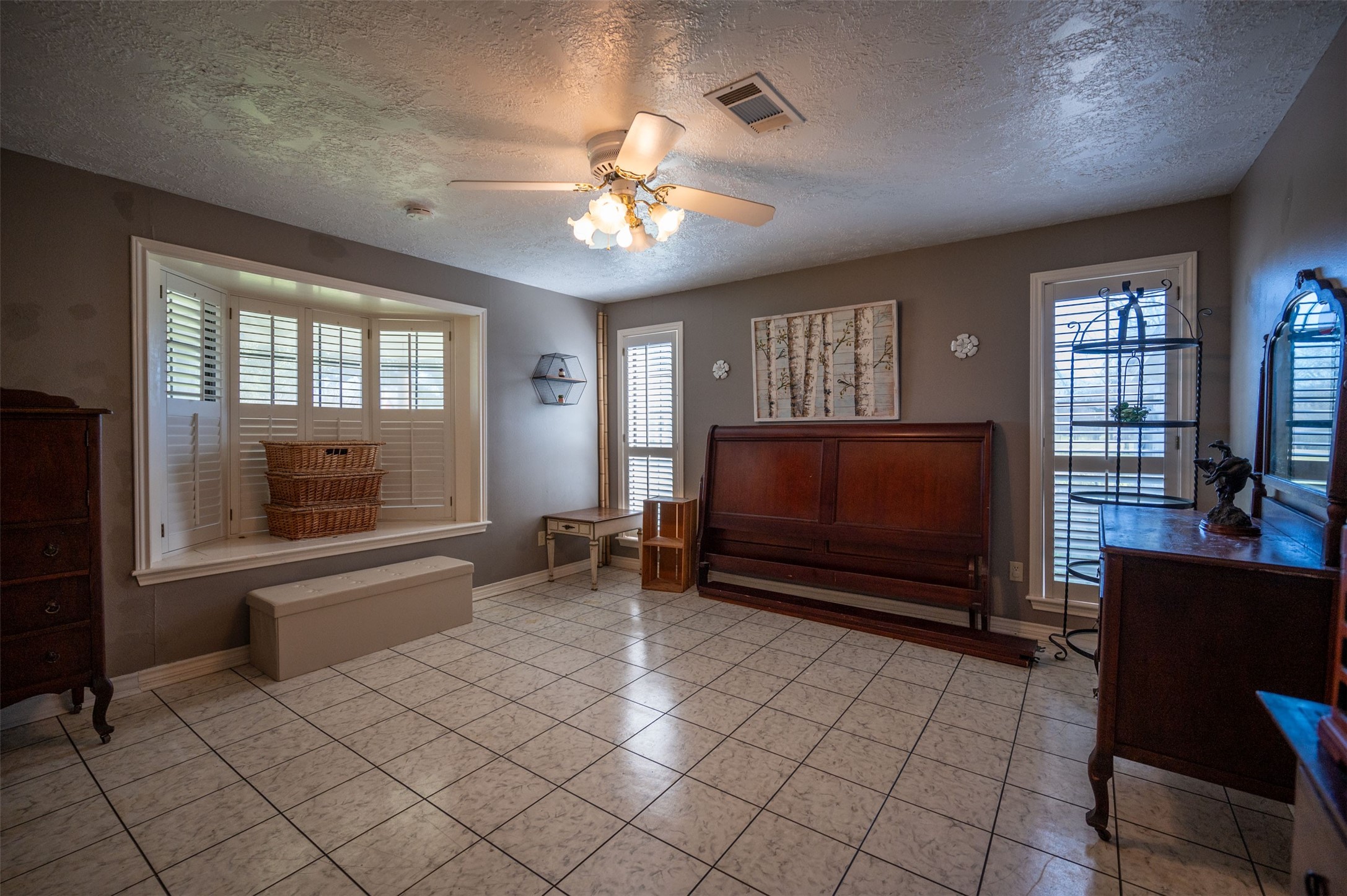 228 Camden Road Chester, TX 75936 - Photo 41 of 50 a living room with furniture a flat screen tv and a window