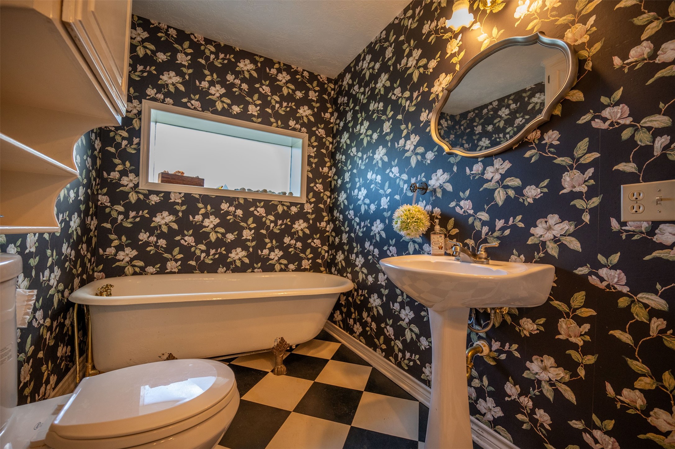 228 Camden Road Chester, TX 75936 - Photo 42 of 50 a bathroom with a sink a toilet and a mirror