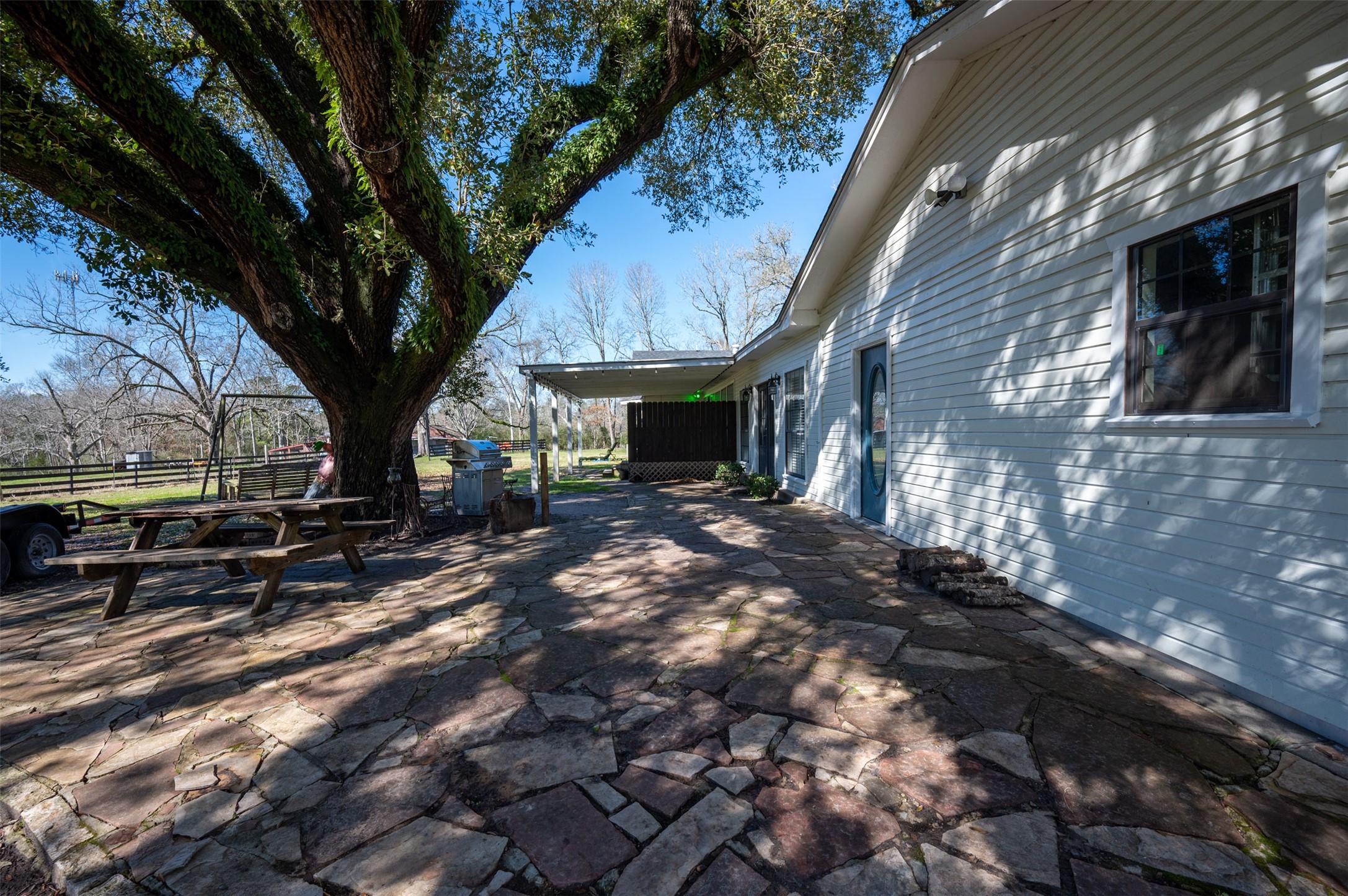 228 Camden Road Chester, TX 75936 - Photo 10 of 50 a view of a house with a tree