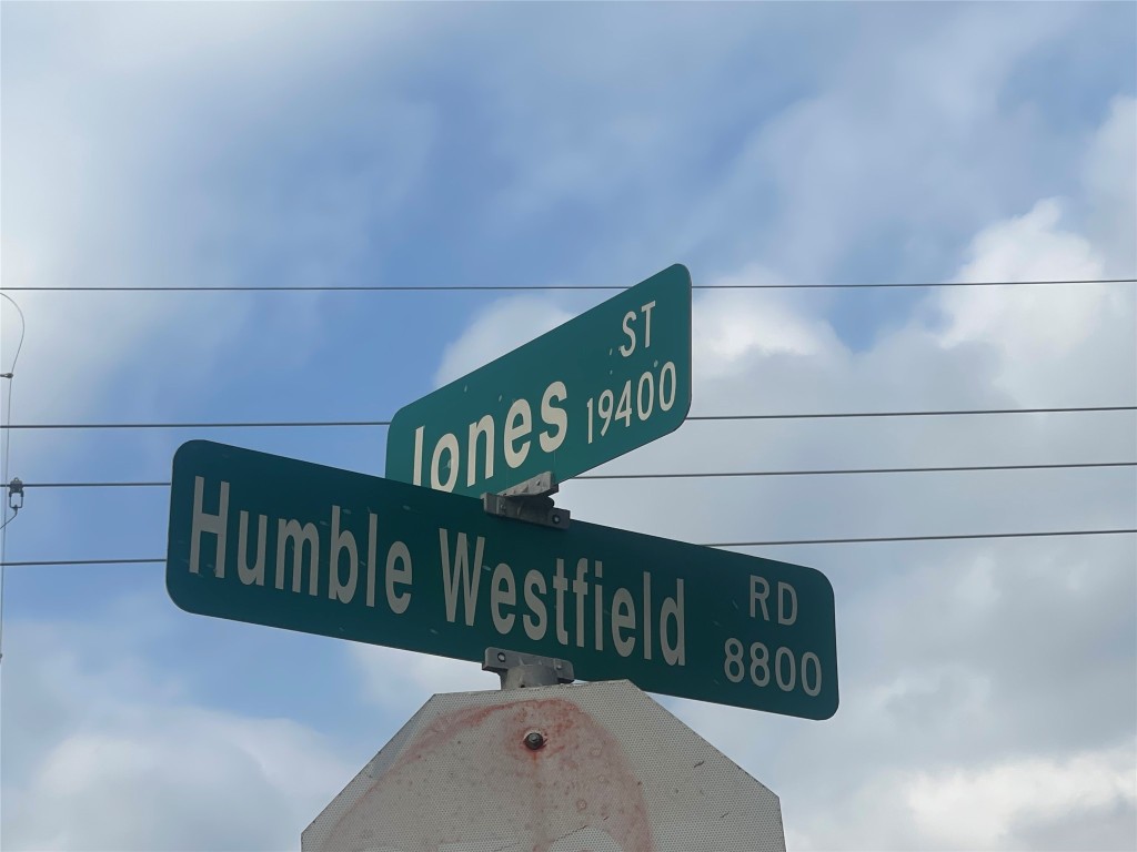 0 Fm-1960 Road West Houston, TX 77090 - Photo 1 of 8 a view of a street sign