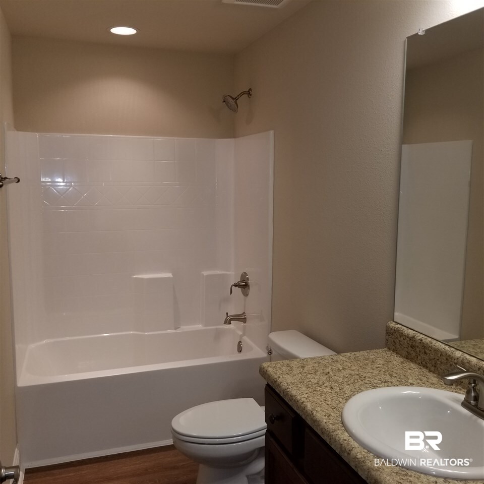 14606 Troon Drive Foley, AL 36535 - Photo 18 of 18 Large second bath. Flood light over tub/shower