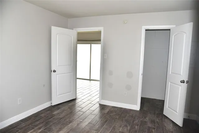 a bathroom with a sink a mirror and a shower