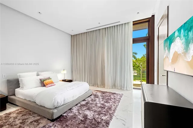a view of a patio with a table chairs and a patio