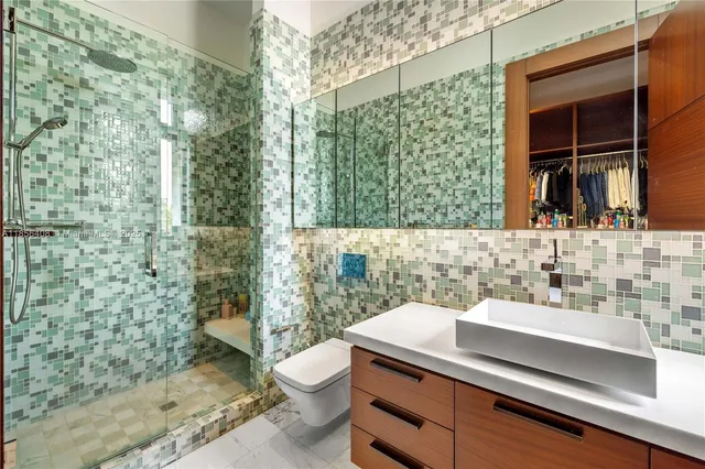 a view of house with yard and swimming pool