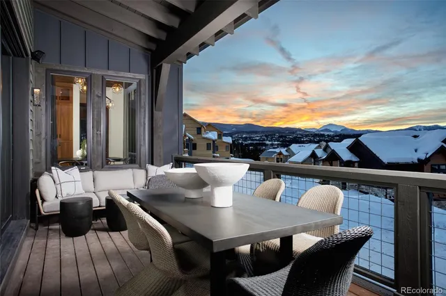 a view of table and chairs in patio