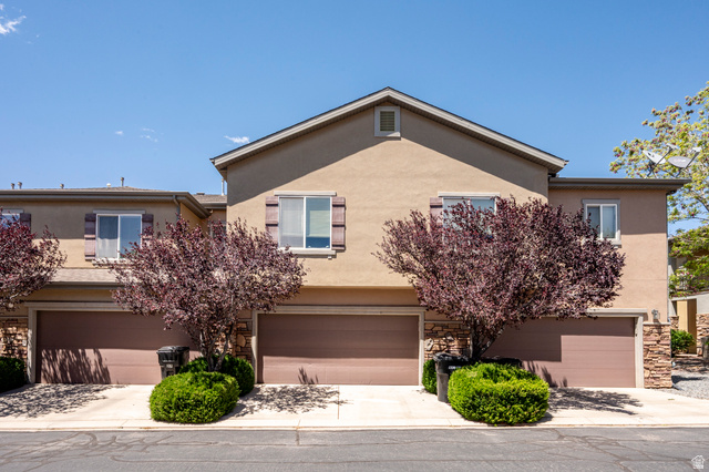1177 Northfield Road, Unit 26 Cedar City, UT 84721 - Photo 33 of 45 Multi-unit residential exterior featuring stucco siding and a pitched roofline