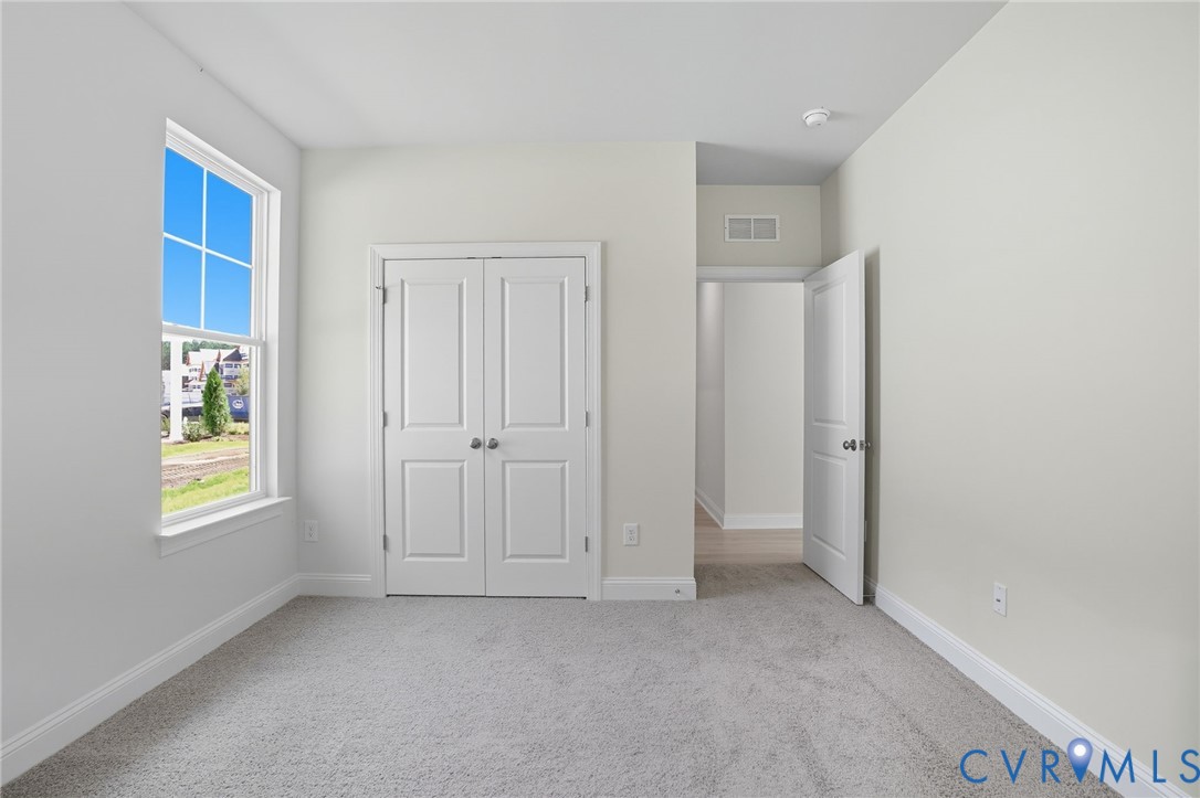 16932 Barmer Road Chesterfield, VA 23832 - Photo 12 of 33 a view of an empty room with a window