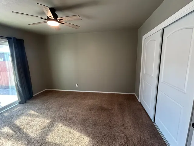 a view of an empty room and window