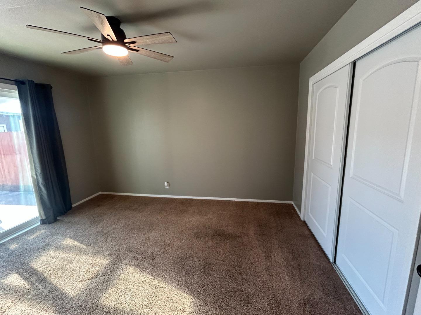 196 Surf Street Pacifica, CA 94044 - Photo 14 of 18 a view of an empty room and window