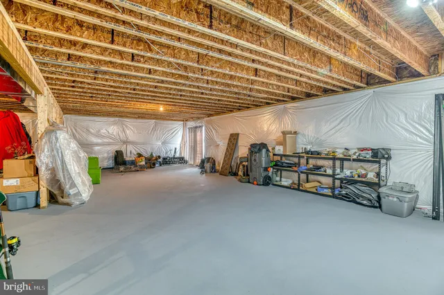 an aerial view of a house with swimming pool
