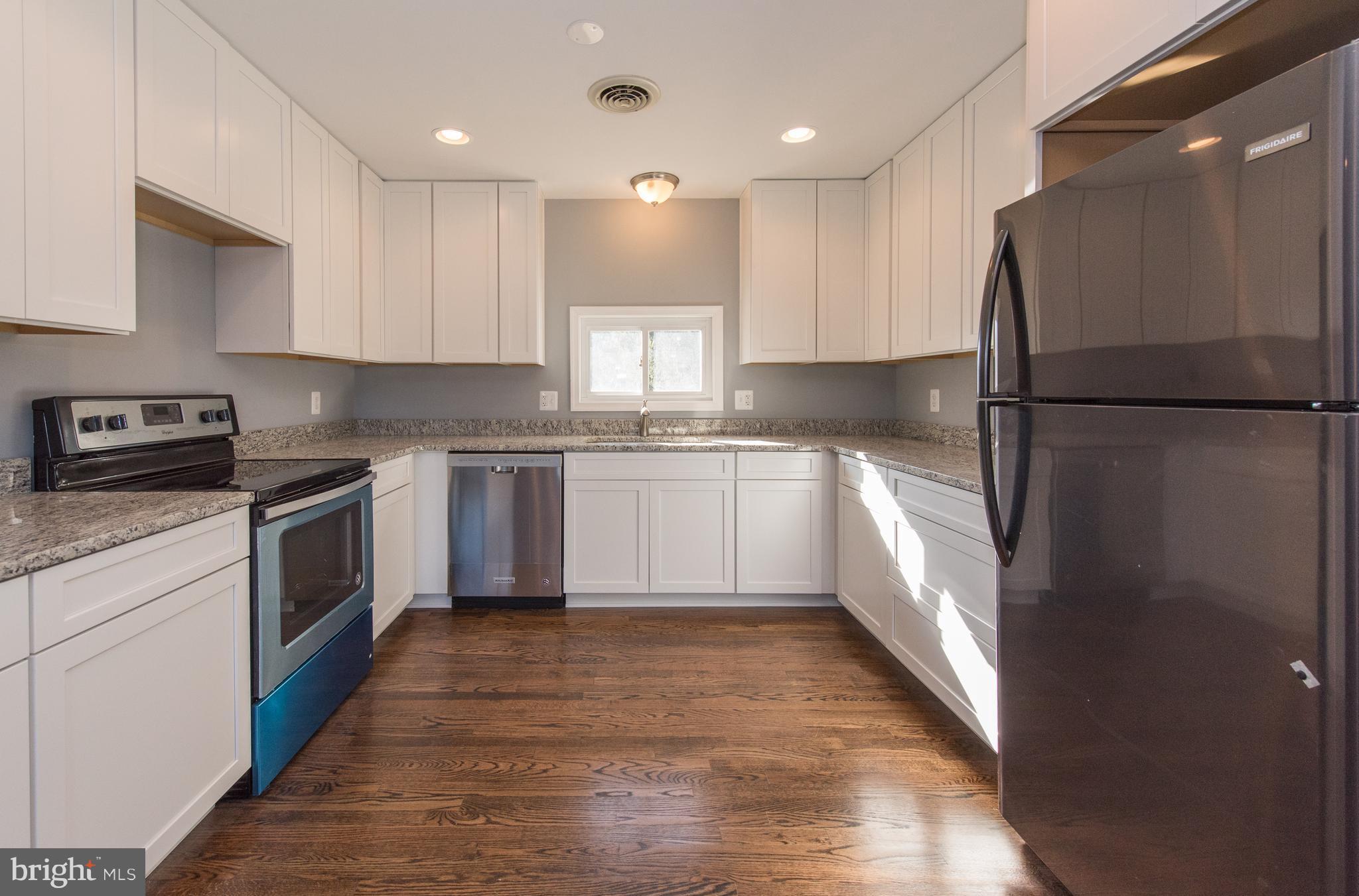 10601 Johns Hopkins Road Laurel, MD 20723 - Photo 11 of 28 New Granite, Hardwoods, Cabinets, Stainless Apps