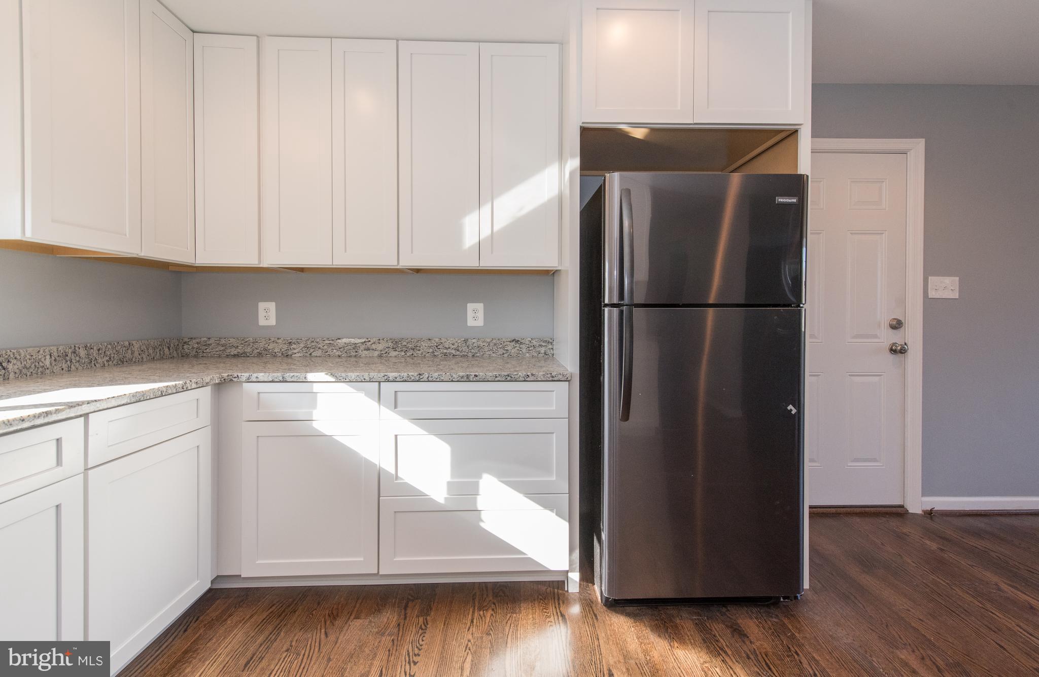 10601 Johns Hopkins Road Laurel, MD 20723 - Photo 9 of 28 New Granite, Hardwoods, Cabinets, Stainless Apps