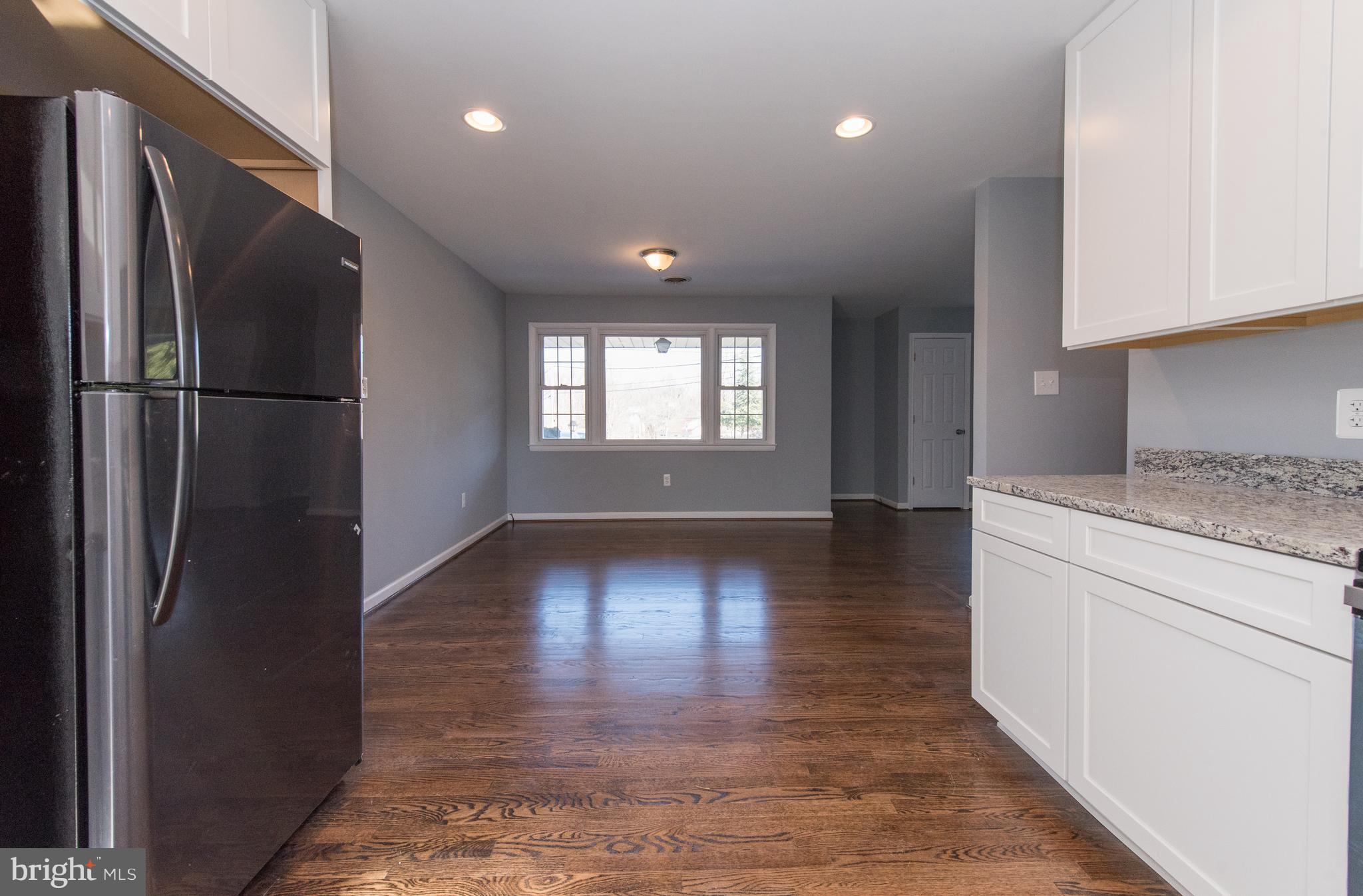 10601 Johns Hopkins Road Laurel, MD 20723 - Photo 10 of 28 New Granite, Hardwoods, Cabinets, Stainless Apps