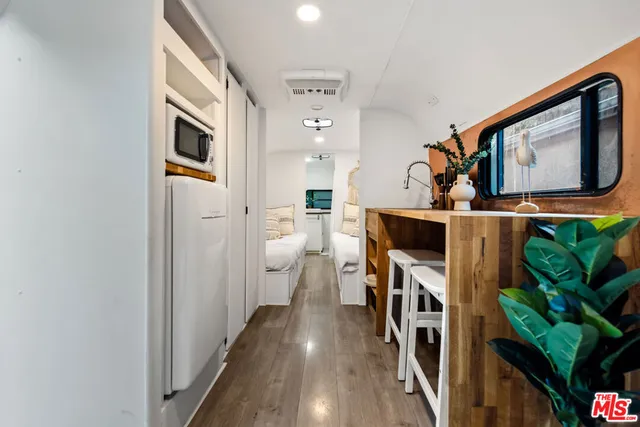 a view of a hallway with workspace