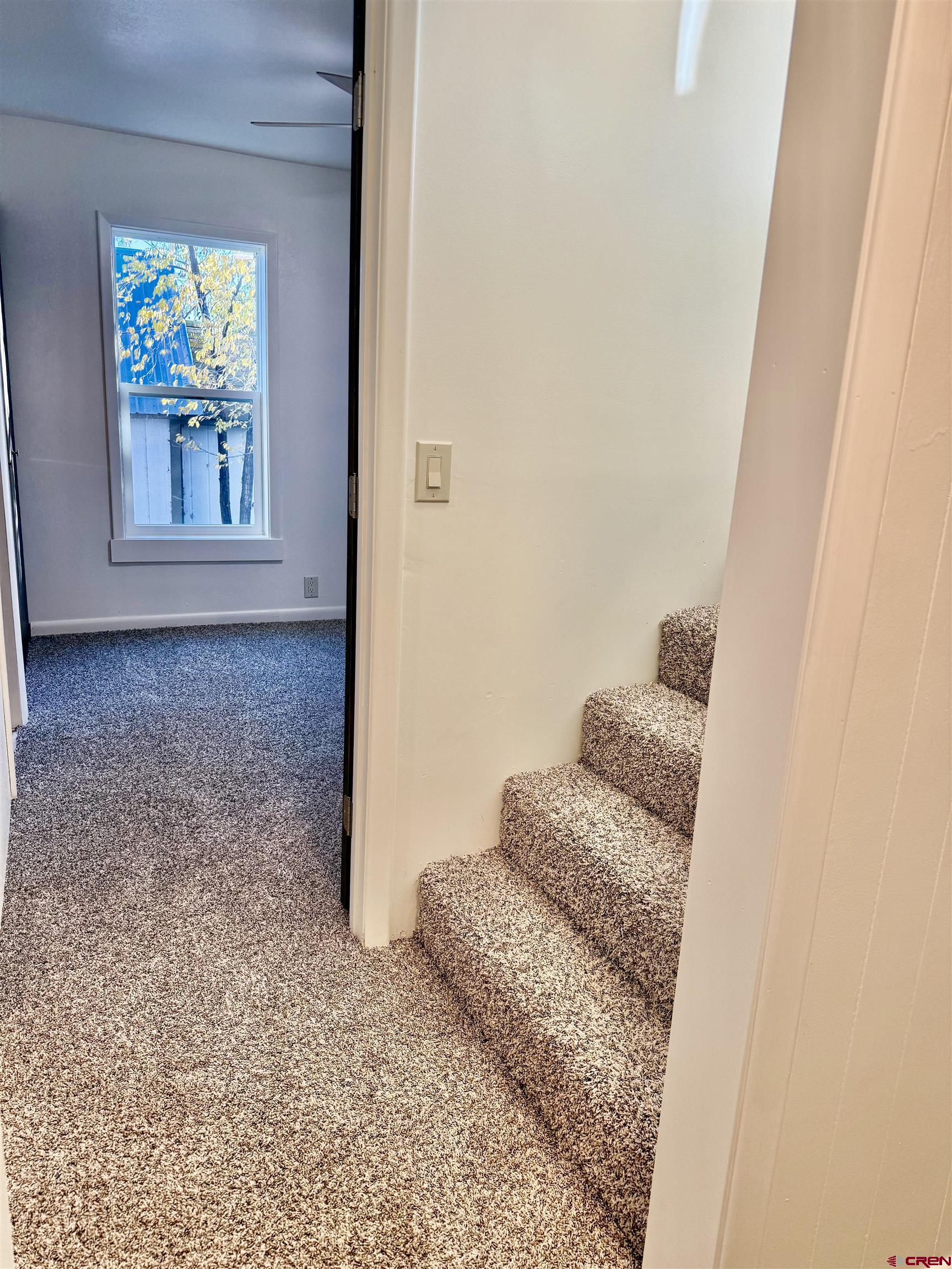 460 Fox Street Nucla, CO 81424 - Photo 23 of 33 view of small space with wooden floor and wall painting
