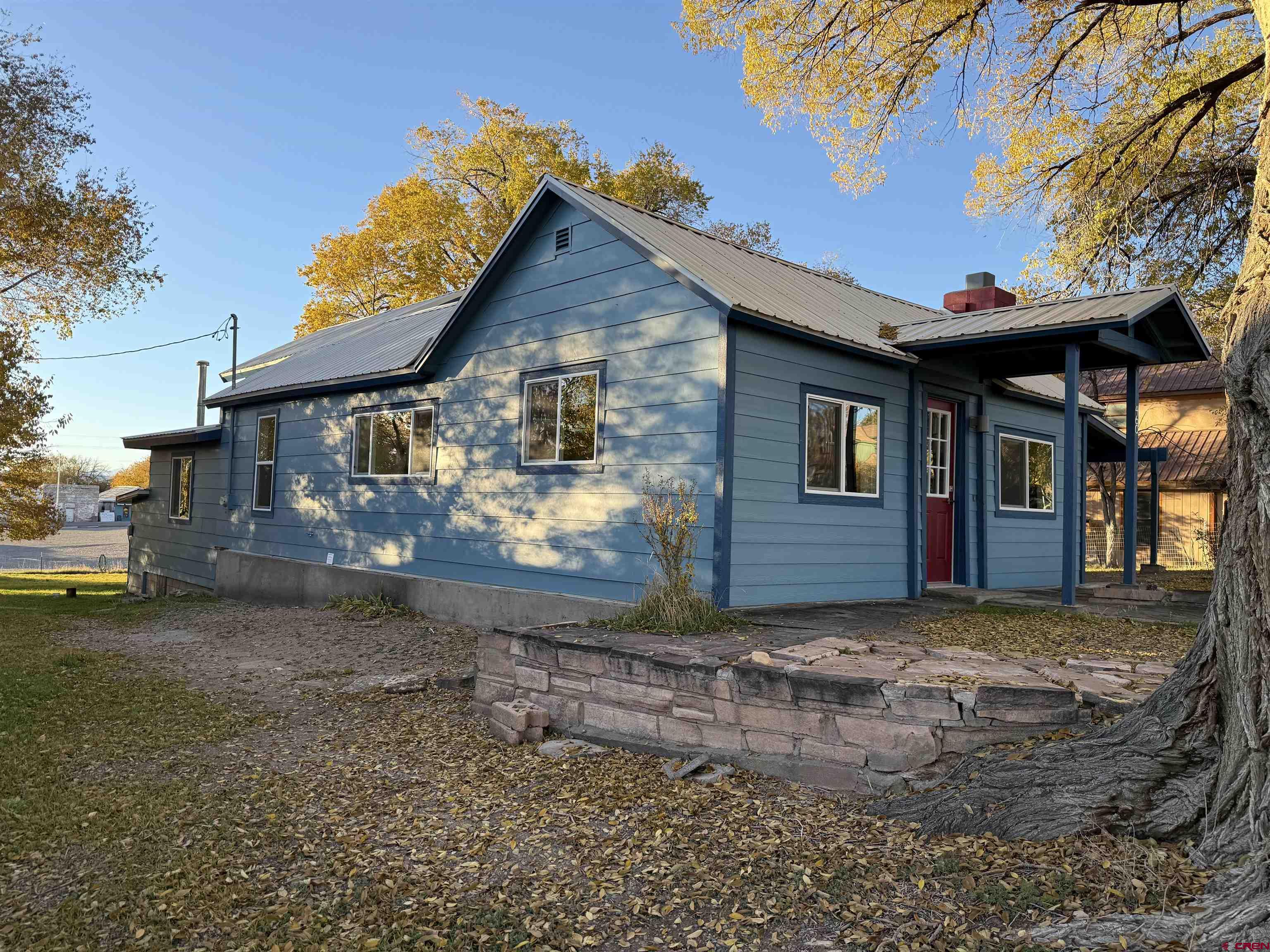 460 Fox Street Nucla, CO 81424 - Photo 3 of 33 a view of a house with a yard