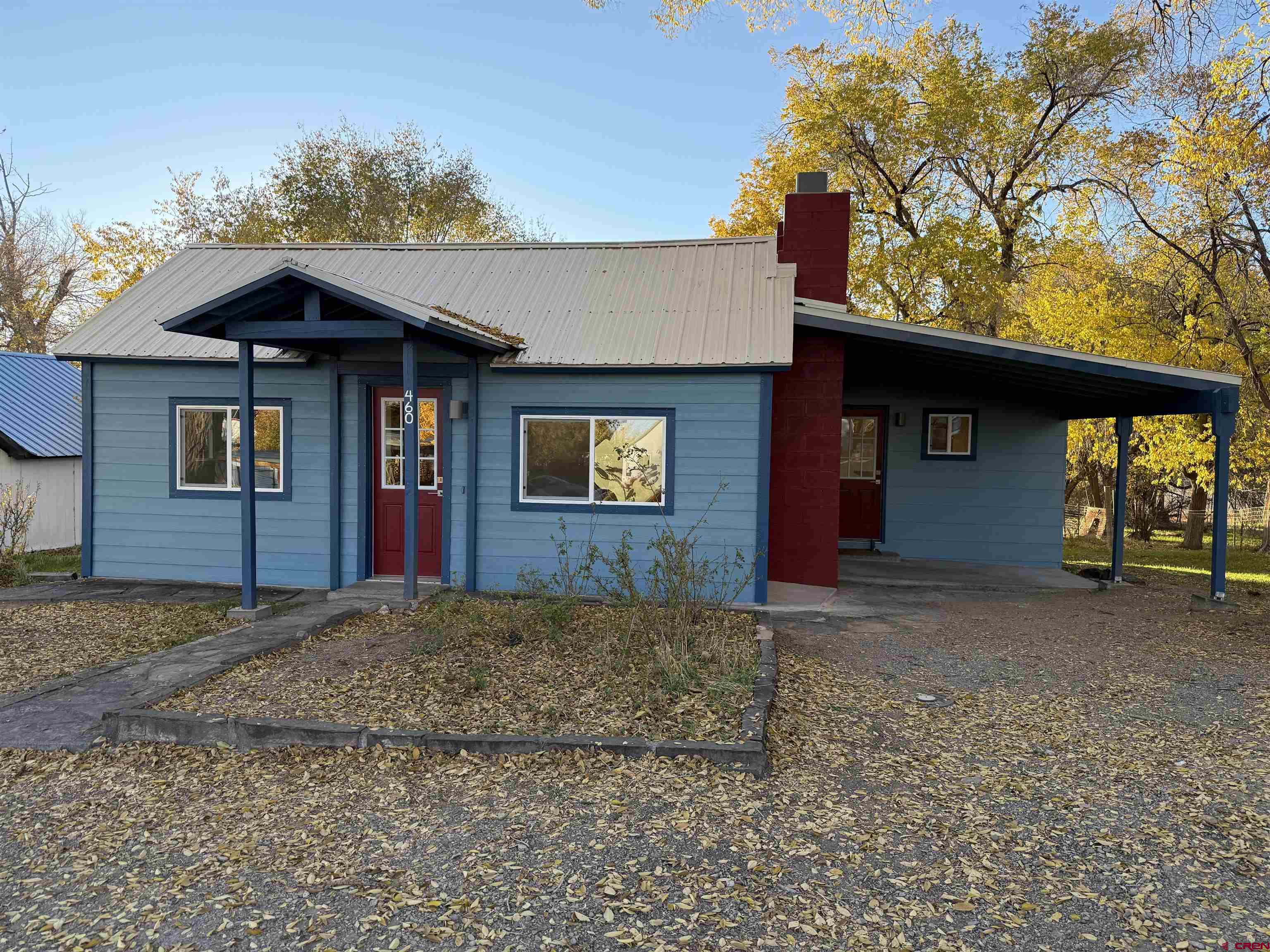 460 Fox Street Nucla, CO 81424 - Photo 3 of 33 a front view of a house with garden