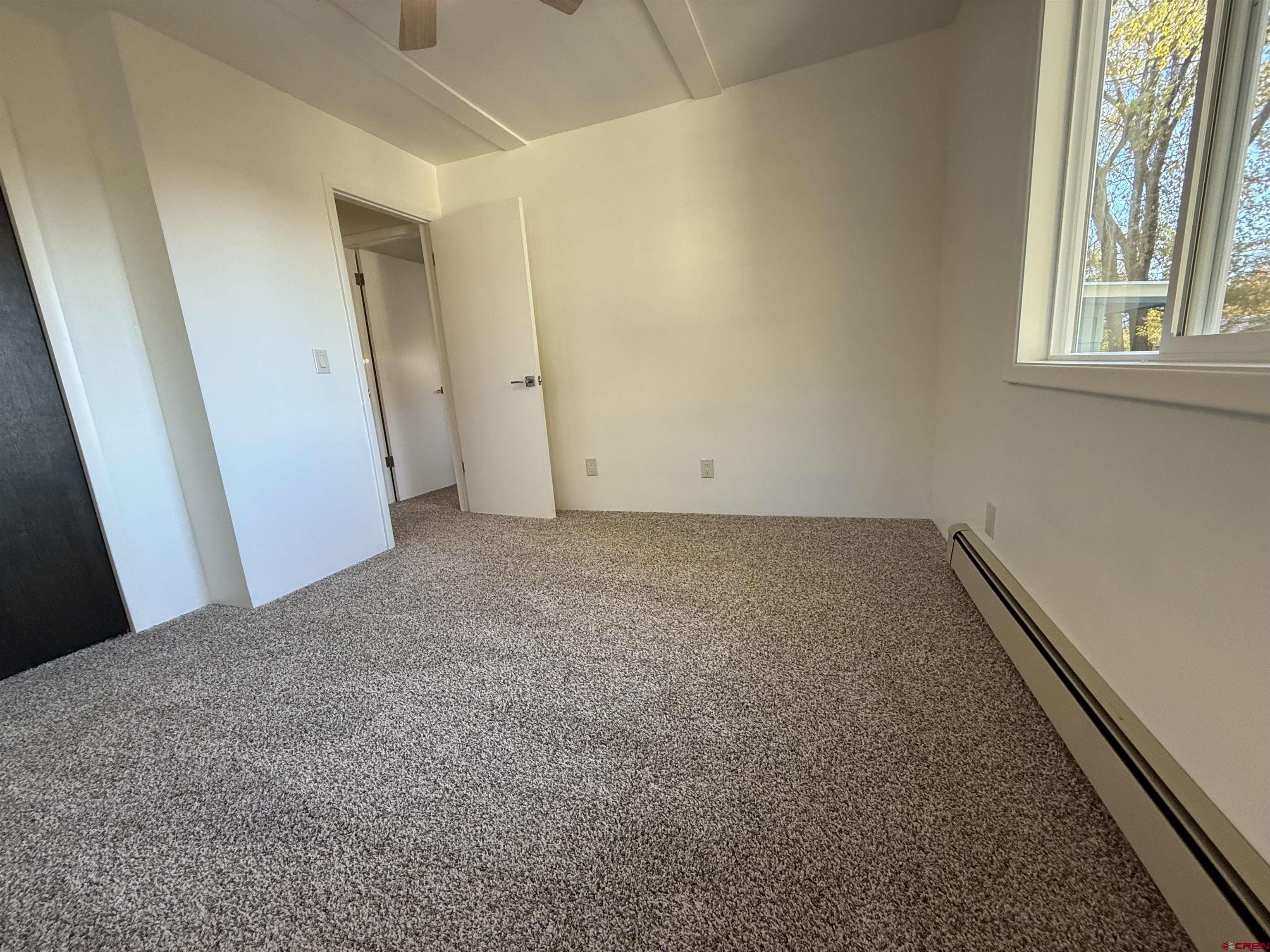 460 Fox Street Nucla, CO 81424 - Photo 32 of 33 an empty room with windows