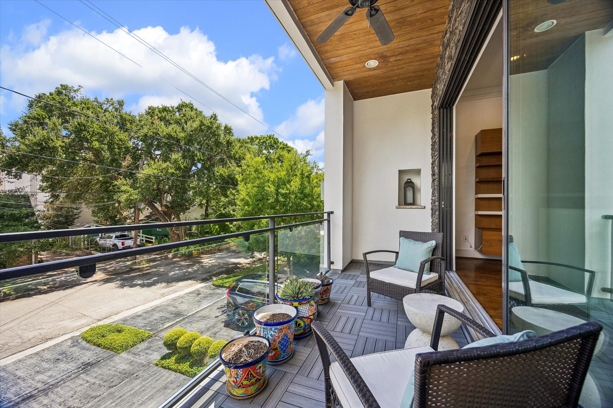 1810 Ridgewood Street Houston, TX 77006 - Photo 6 of 30 Enjoy the tranquility of this peaceful street, surrounded by lush greenery, with a beadboard wood ceiling, ceiling fan, and new TREX tile flooring.