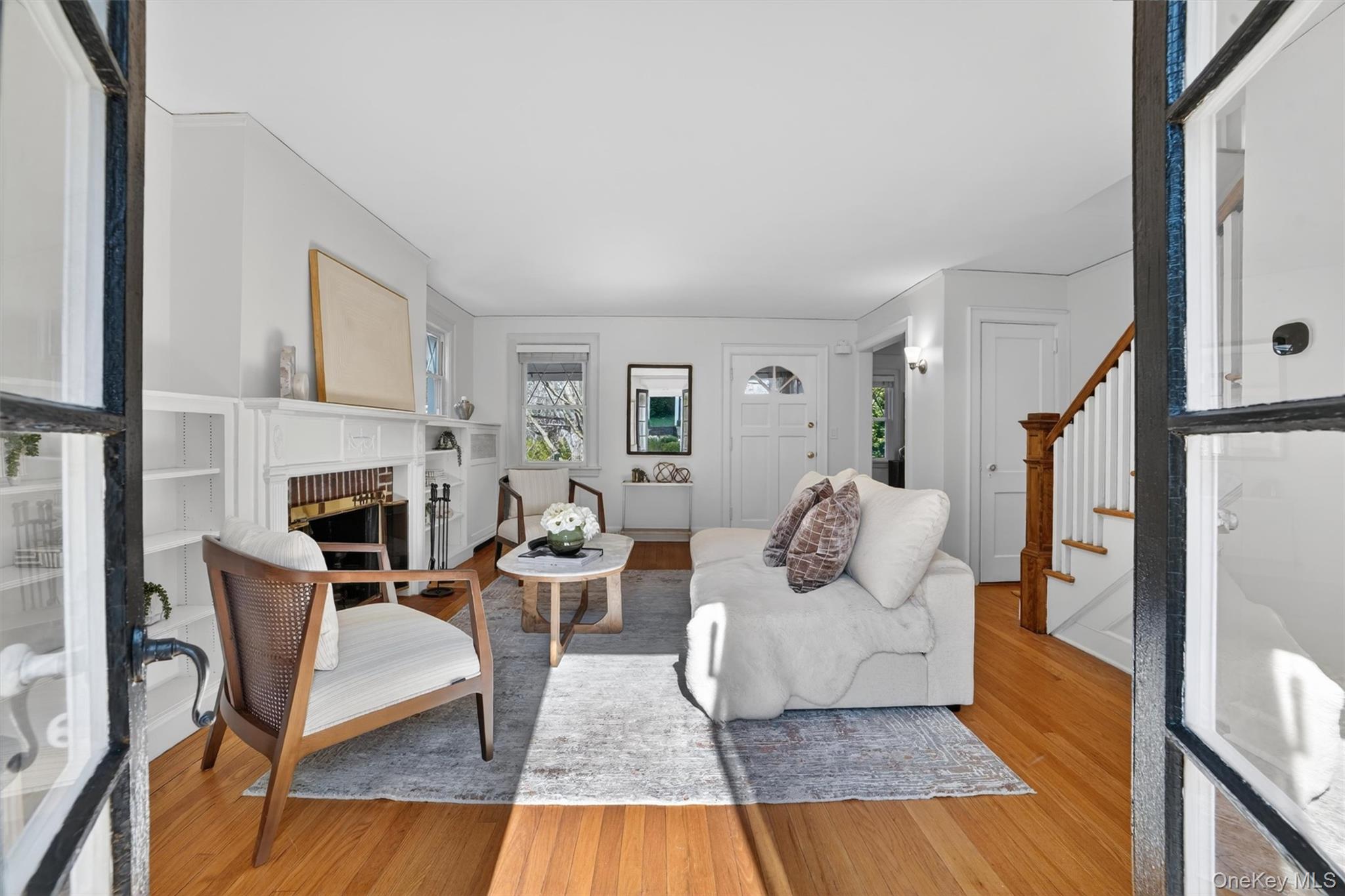 404 Bronxville Road Bronxville, NY 10708 - Photo 13 of 43 a living room with furniture fireplace and a fireplace