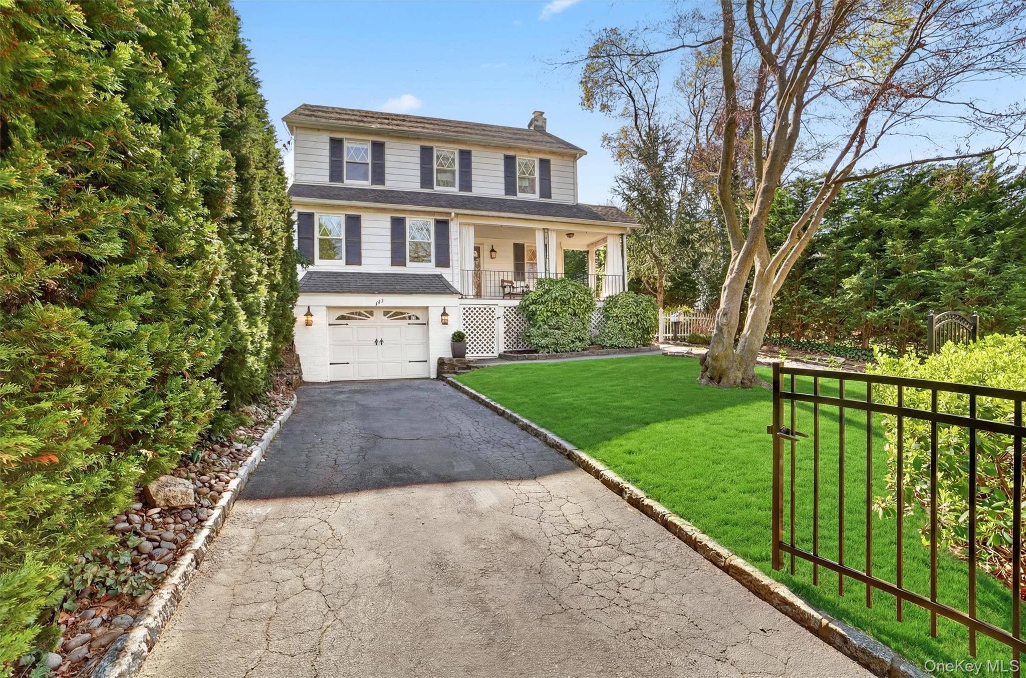 404 Bronxville Road Bronxville, NY 10708 - Photo 2 of 43 a front view of a house with yard