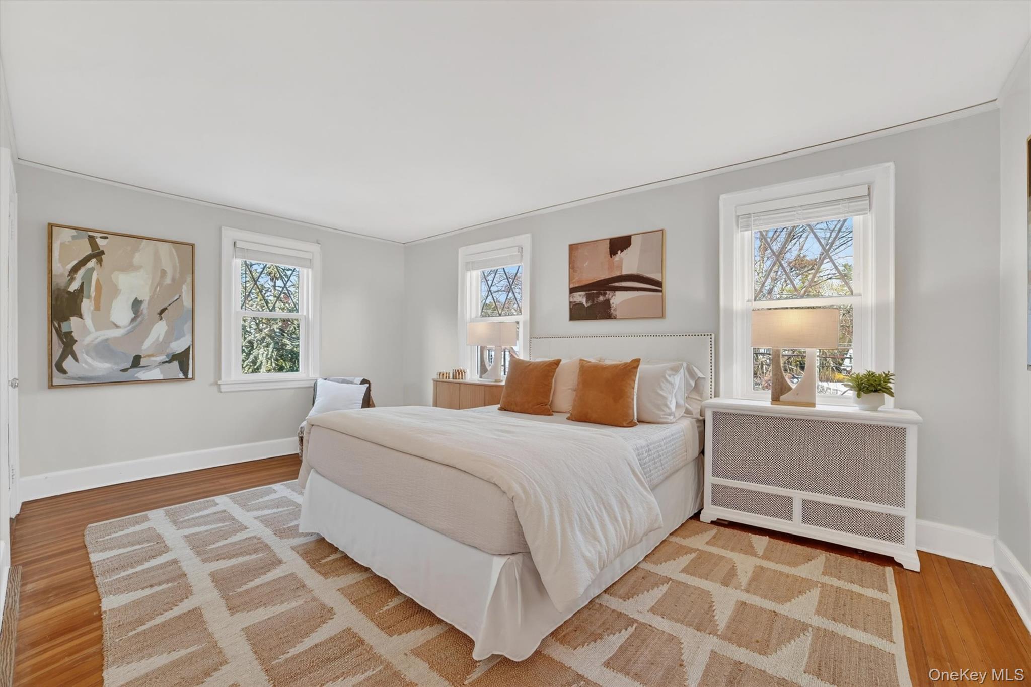 404 Bronxville Road Bronxville, NY 10708 - Photo 25 of 43 a bedroom with a large bed and a window