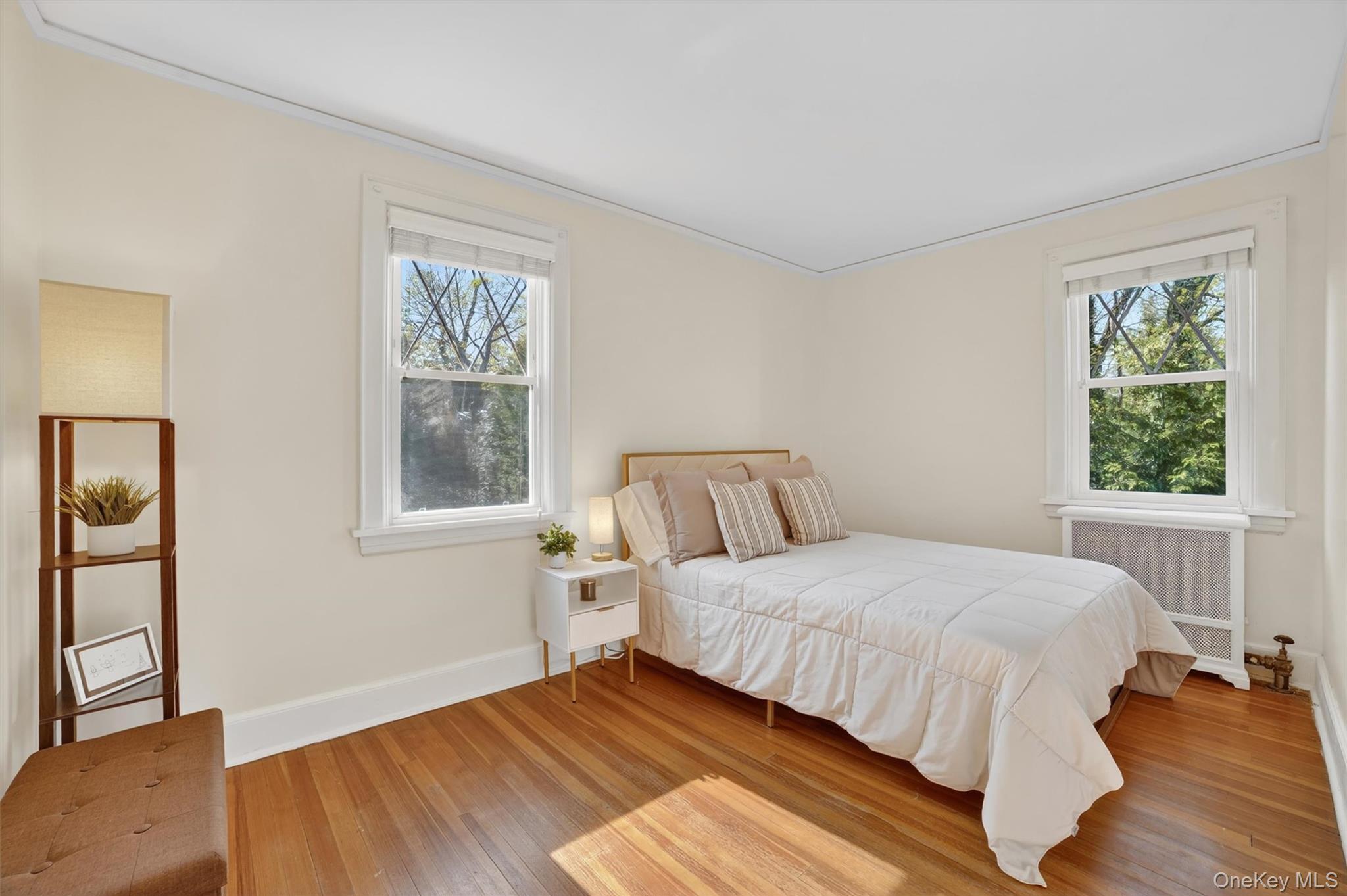 404 Bronxville Road Bronxville, NY 10708 - Photo 28 of 43 a bedroom with a bed and a window