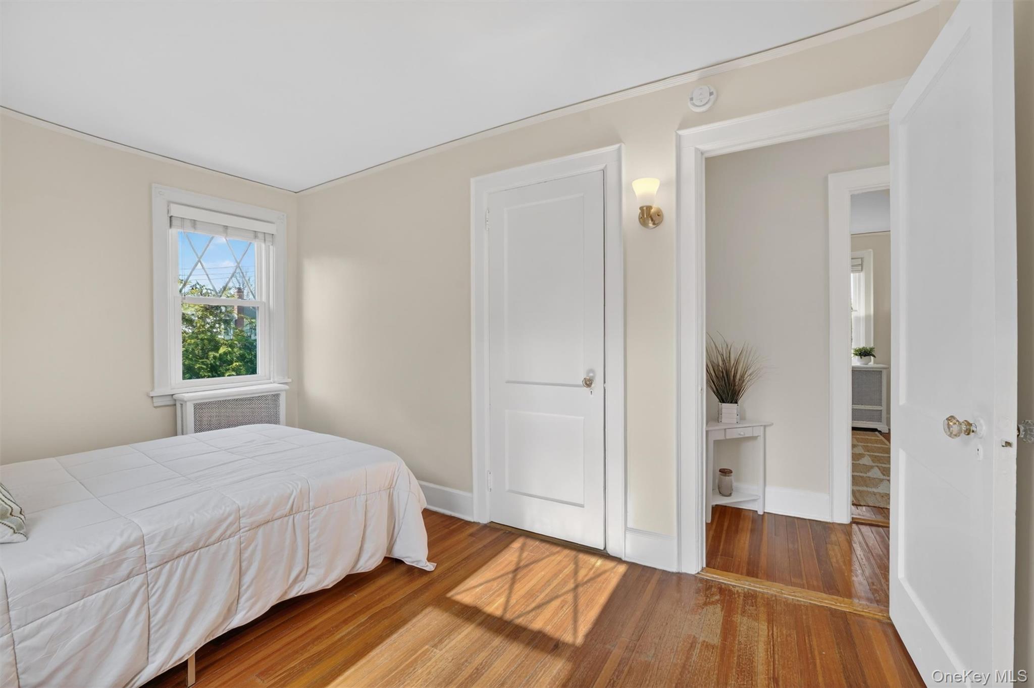 404 Bronxville Road Bronxville, NY 10708 - Photo 29 of 43 a bedroom with a bed and a window