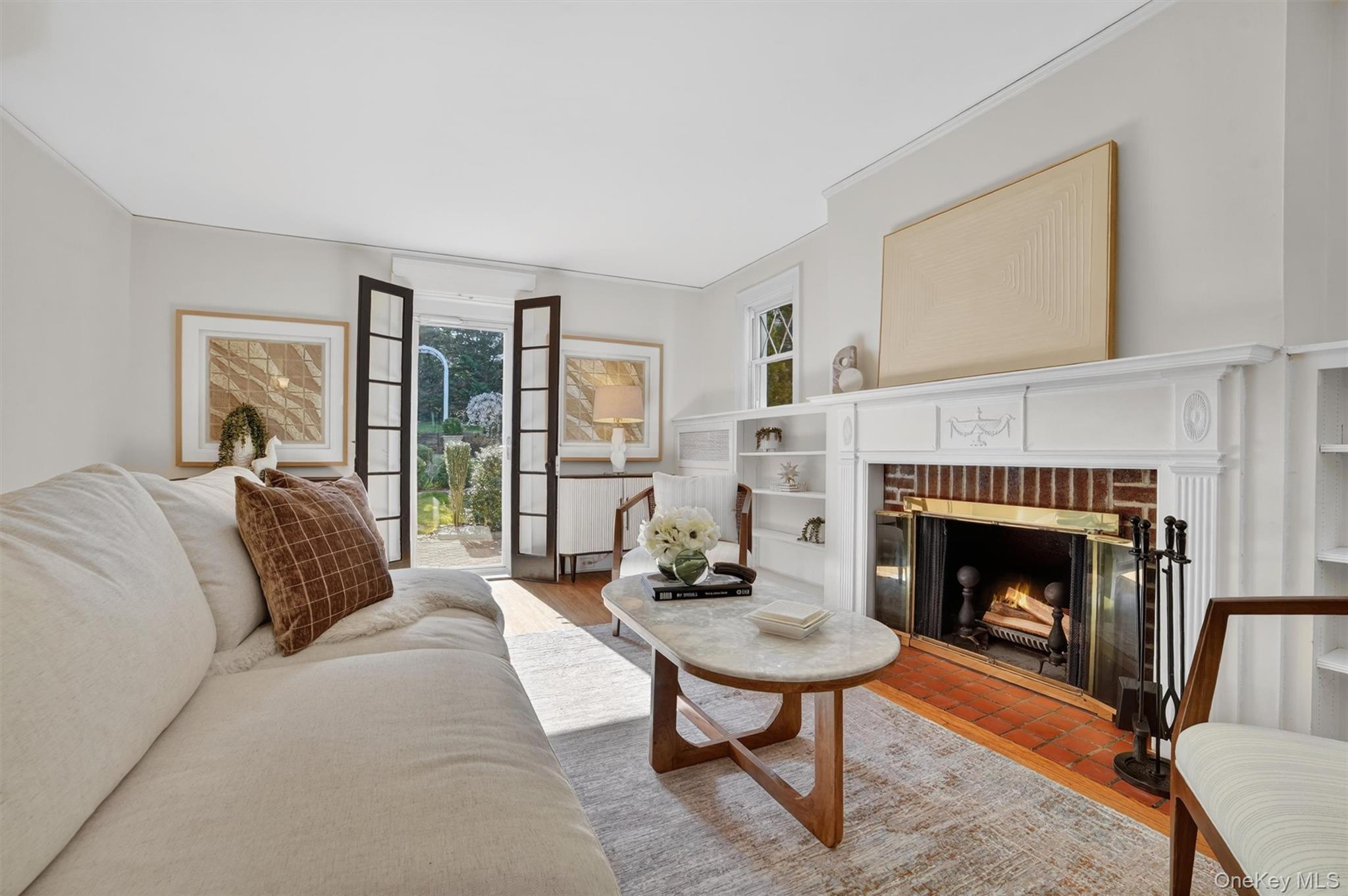 404 Bronxville Road Bronxville, NY 10708 - Photo 9 of 43 a bedroom with a bed and a fireplace